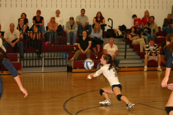 Sophomore Lady Shark Heather Watson with a dig.  