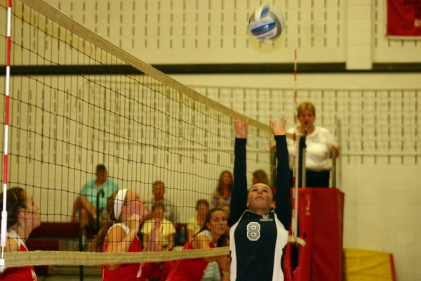 Senior setter Sam Tumolo sets the ball for ESM in the teams game at Connetquot on Friday.