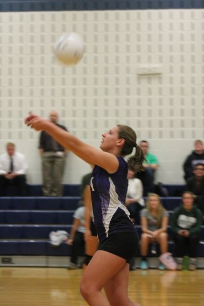 Alexis Fotopoulos gets under the ball during her final game as a Lady Bayman. KERRY MONACO