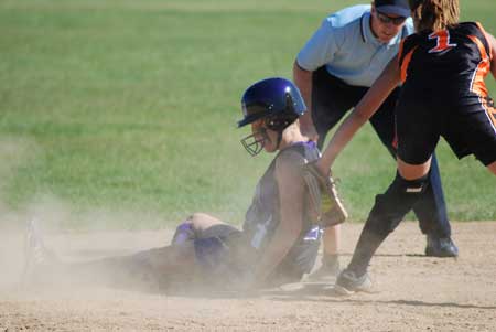 Genna Kovar steals one of her three bases.