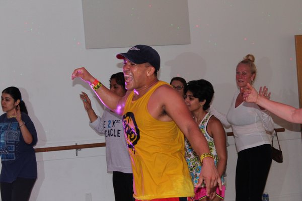 Oscar Gonzalez leads a zumba class at Dance Centre of the Hamptons in Westhampton Beach. KERRY MONACO