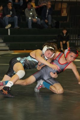 Dane Mendoza (99 pounds) pinned his Amityville opponent in 1:12. KERRY MONACO