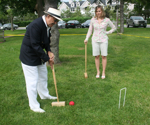  plays a round of croquet. Pat Barile looks on. JESSICA DINAPOLI