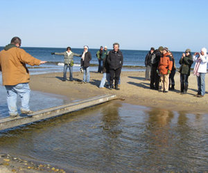 Ed Johann explaining the Seal Haulout Trail hike to a group of family and friends