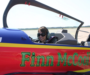Stunt Pilot Mike Mancuso and reporter Vera Chinese prepare for take-off in an Extra 300L. JESSICA DINAPOLI