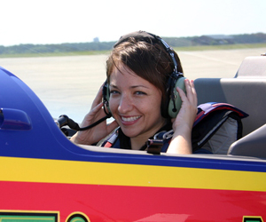 Stunt Pilot Mike Mancuso and reporter Vera Chinese prepare for take-off in an Extra 300L. JESSICA DINAPOLI