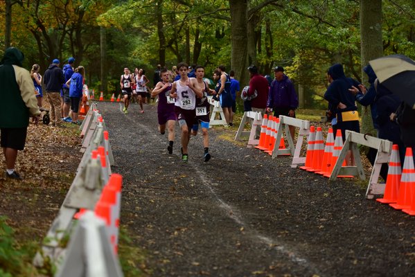 Bayman Christian Berglin and another runner trail a Southampton runner. RICCI PARADISO