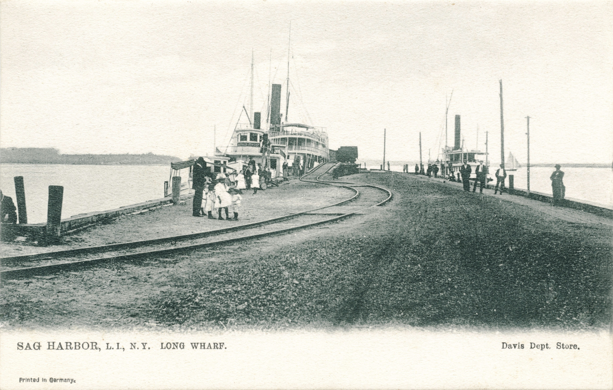 A postcard, circa 1910, shows the railway going onto Long Wharf at just about the same spot where the rail section was found by workers excavating.