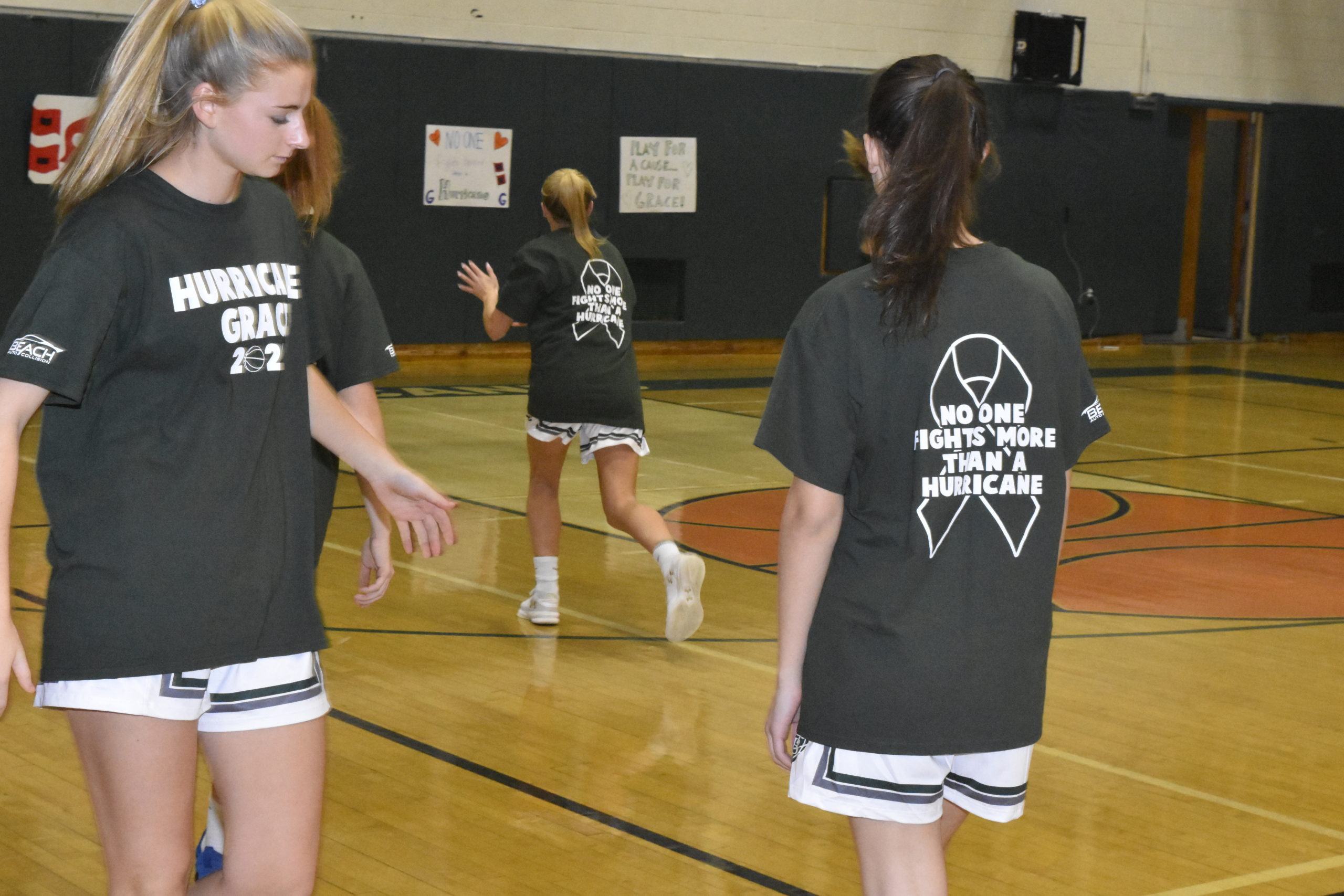 Players, both from Mt. Sinai and Westhampton Beach, wore t-shirts that said 'Hurricane Grace 2020' on the front and 'No One Fights More Than A Hurricane' on the back.