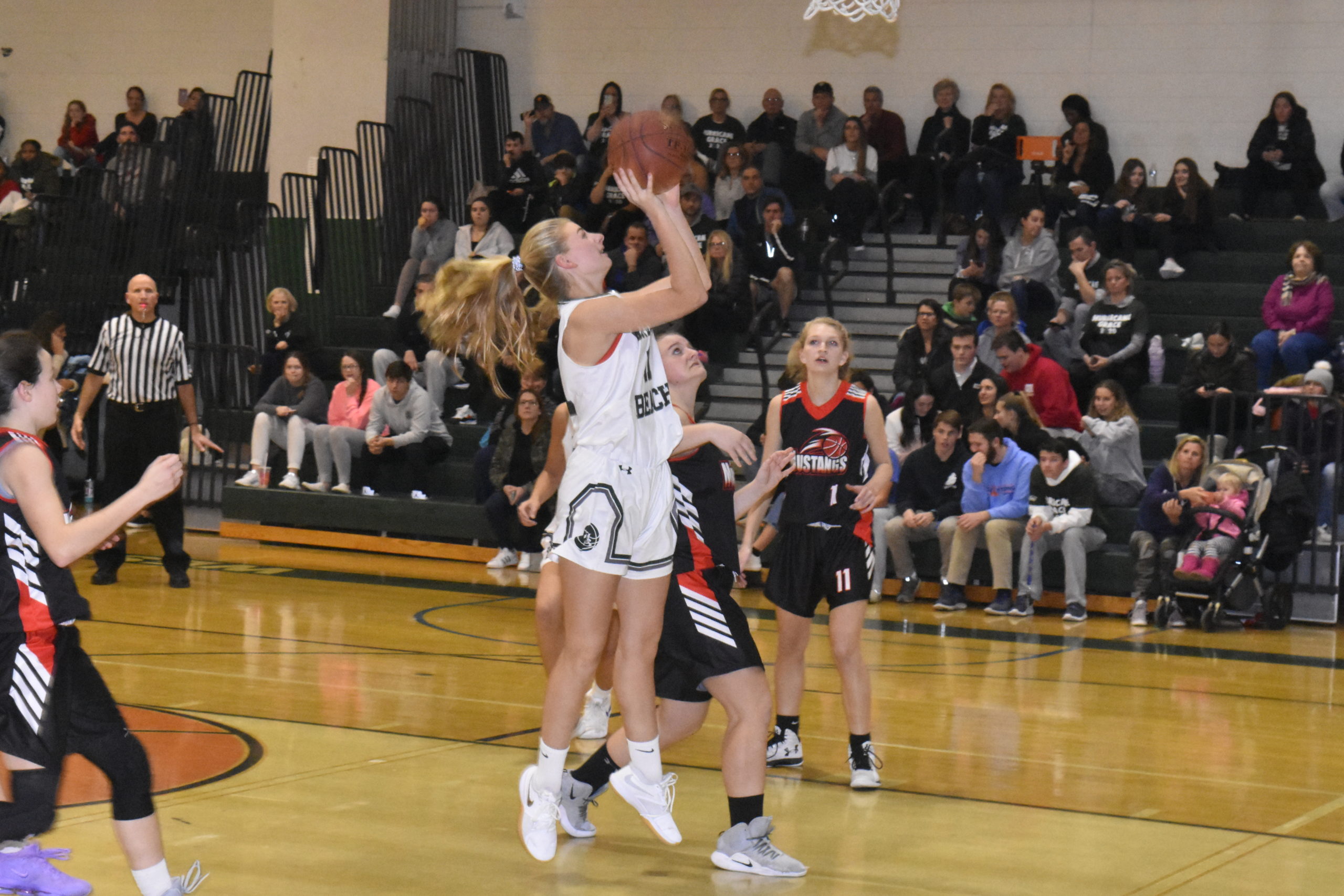 Westhampton Beach junior Molly Skorobohaty puts up a shot.