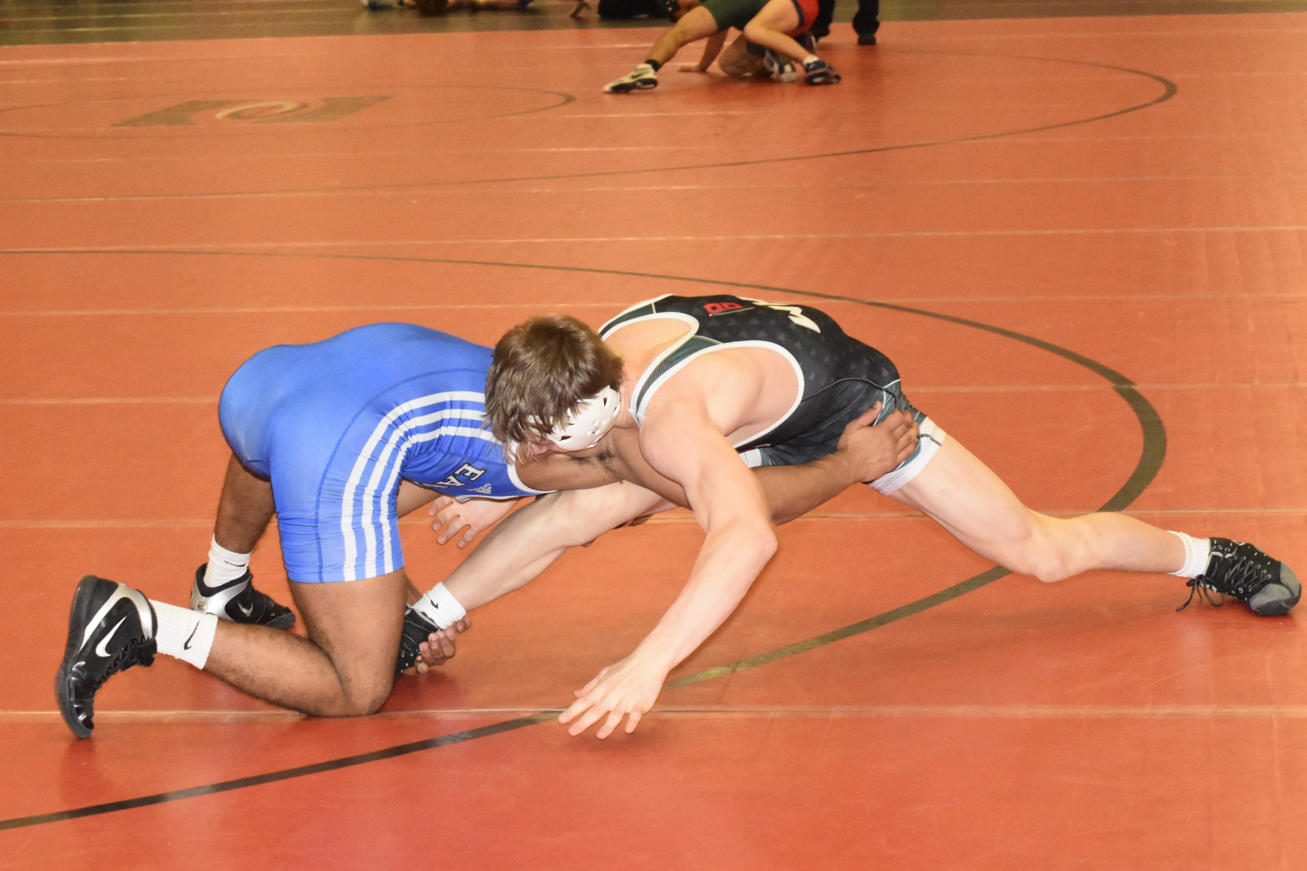 Gavin McIntyre tries to defend against his Copiague opponent.