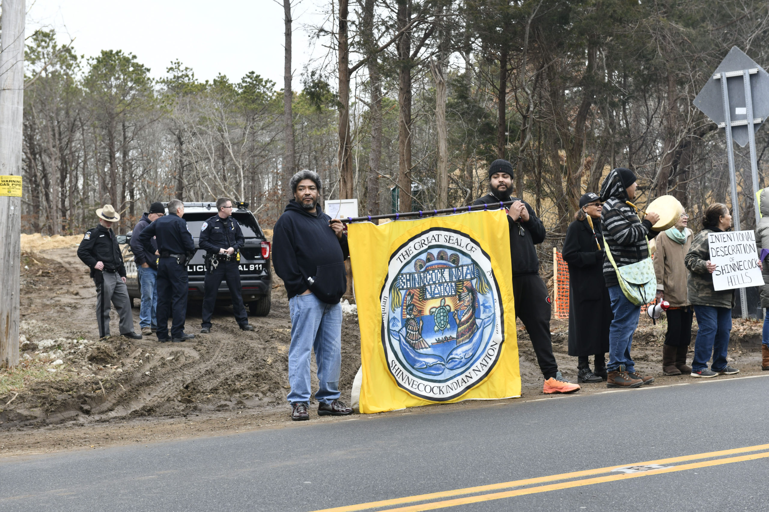 The Shinnecock Indian Nation held a large-scale protest on Tuesday in front of parcel of land in Shinnecock Hills slated for development that is considered sacred to the tribe and a well-known burial site for their ancestors, as well as other Native American tribes.  DANA SHAW