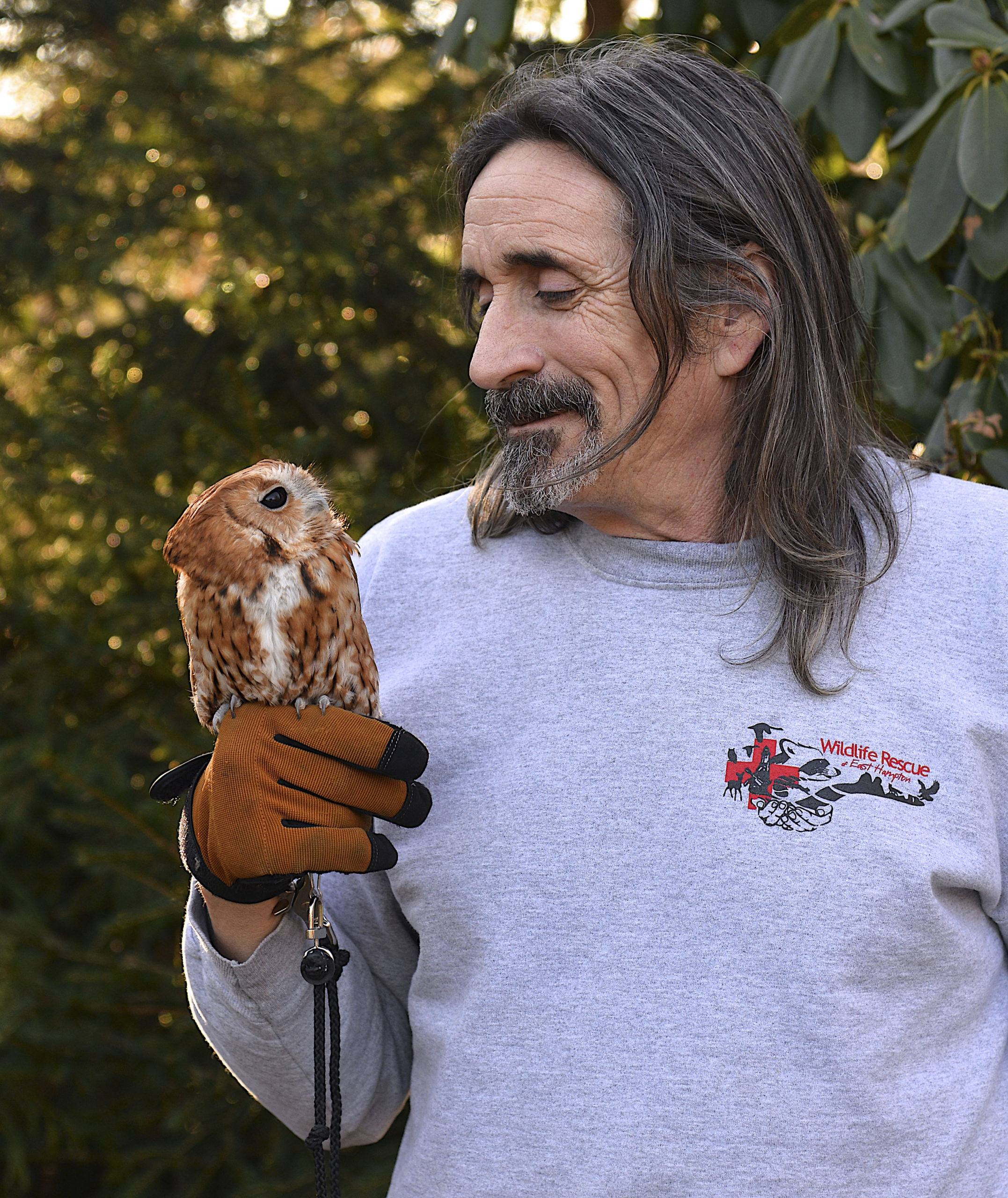 Dell Cullum with blind eastern screech owl Athena.  KYRIL BROMLEY