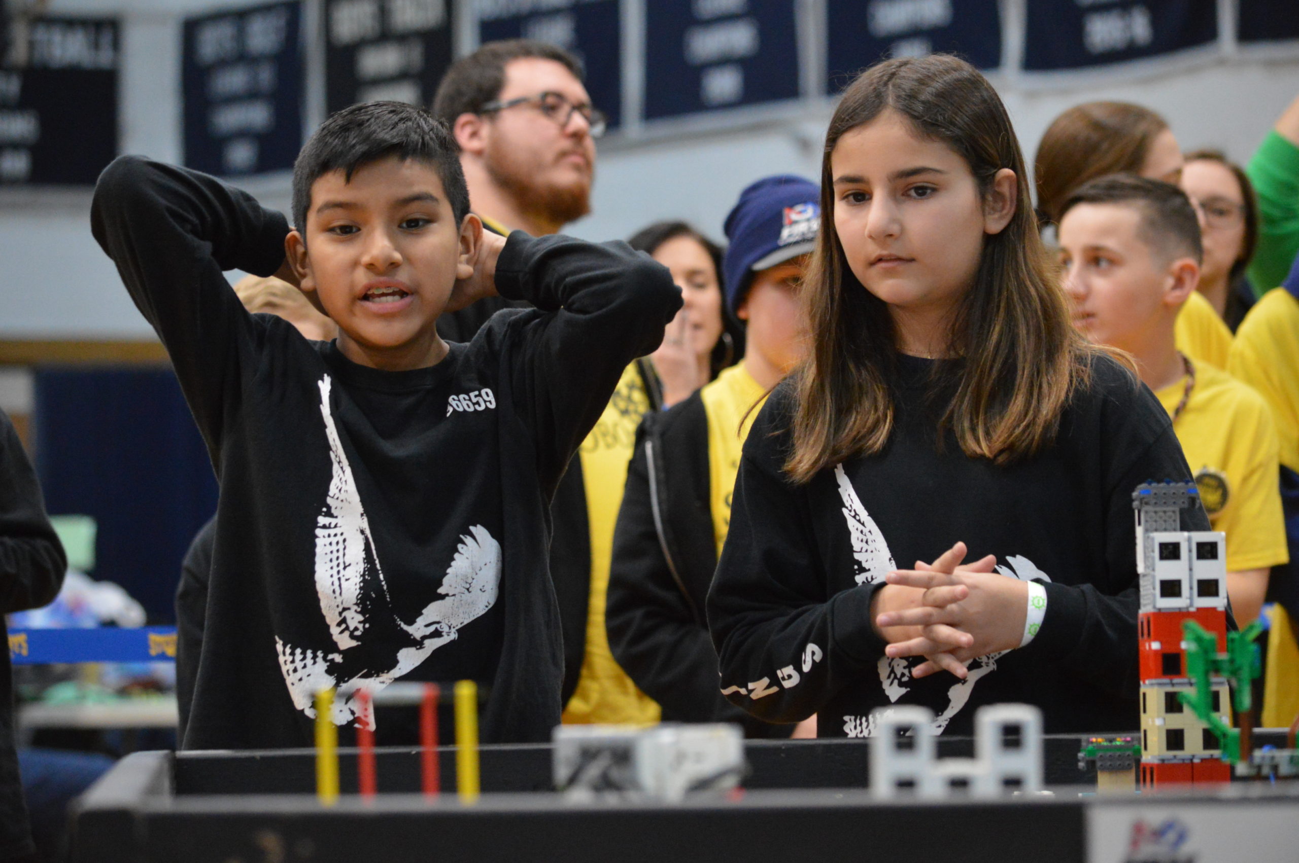 Three teams from Springs School — the Springin’ Ospreys, the Springs School Robonkacers and the Bionic Bonac Builders — competed Saturday at Huntington High School in one of seven qualifier rounds of the Long Island FIRST LEGO League Tournament season. While none of the teams, comprising students in fifth, sixth and seventh grades, advanced to the Long Island final, the teams all placed in the top 10 of the robotics competition. Ariel Puin Mayancela, left, and Shanli Yaghoubi compete for the Springin’ Ospreys at Huntington High School on Saturday. GAVIN MENU 