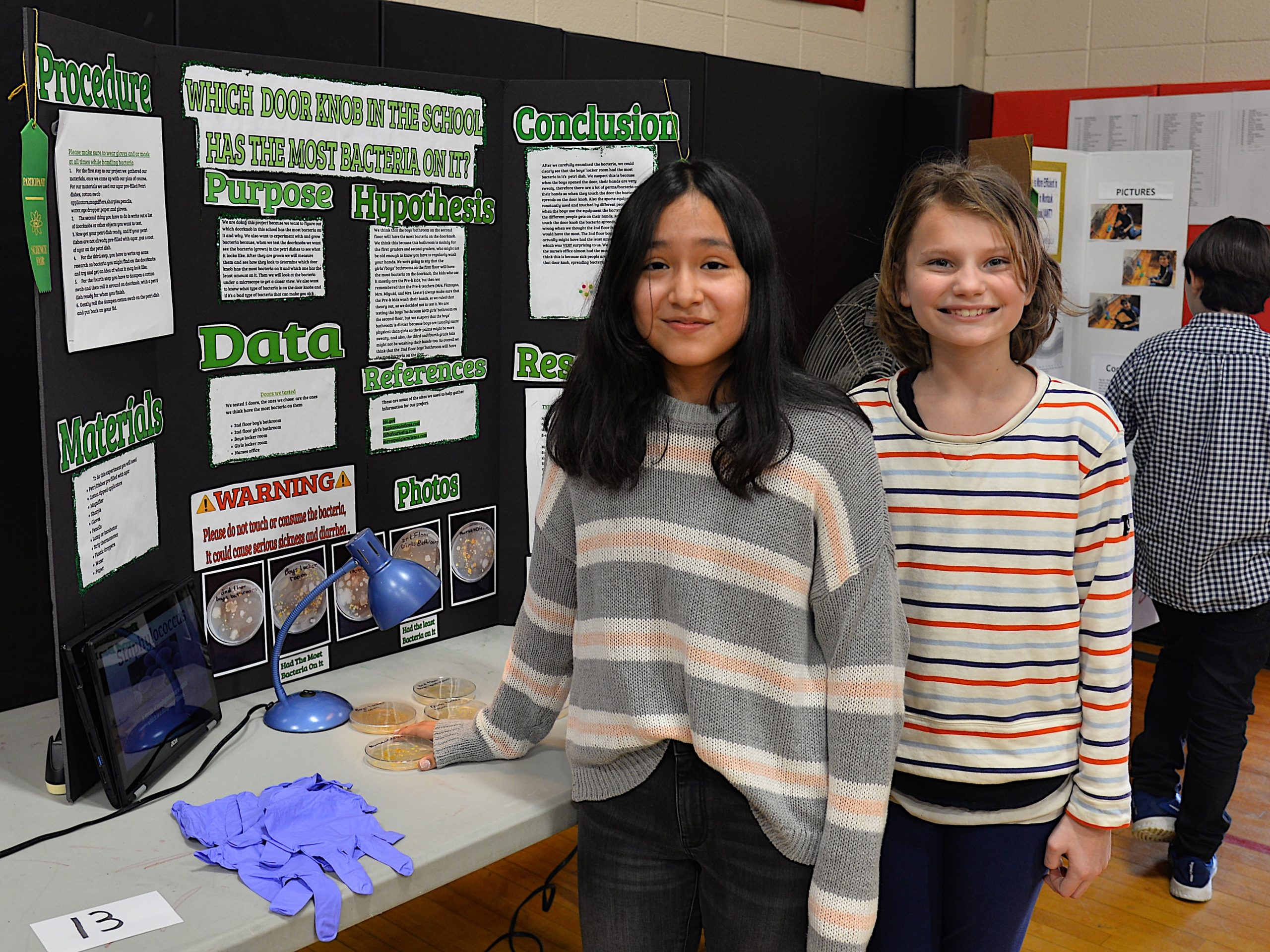 Montauk School and the Concerned Citizens of Montauk partnered for the annual Montauk School Science Fair on Friday. Amanda Arias's and Bea Flight’s project was to determine which school doorknobs contained the most bacteria. KYRIL BROMLEY
