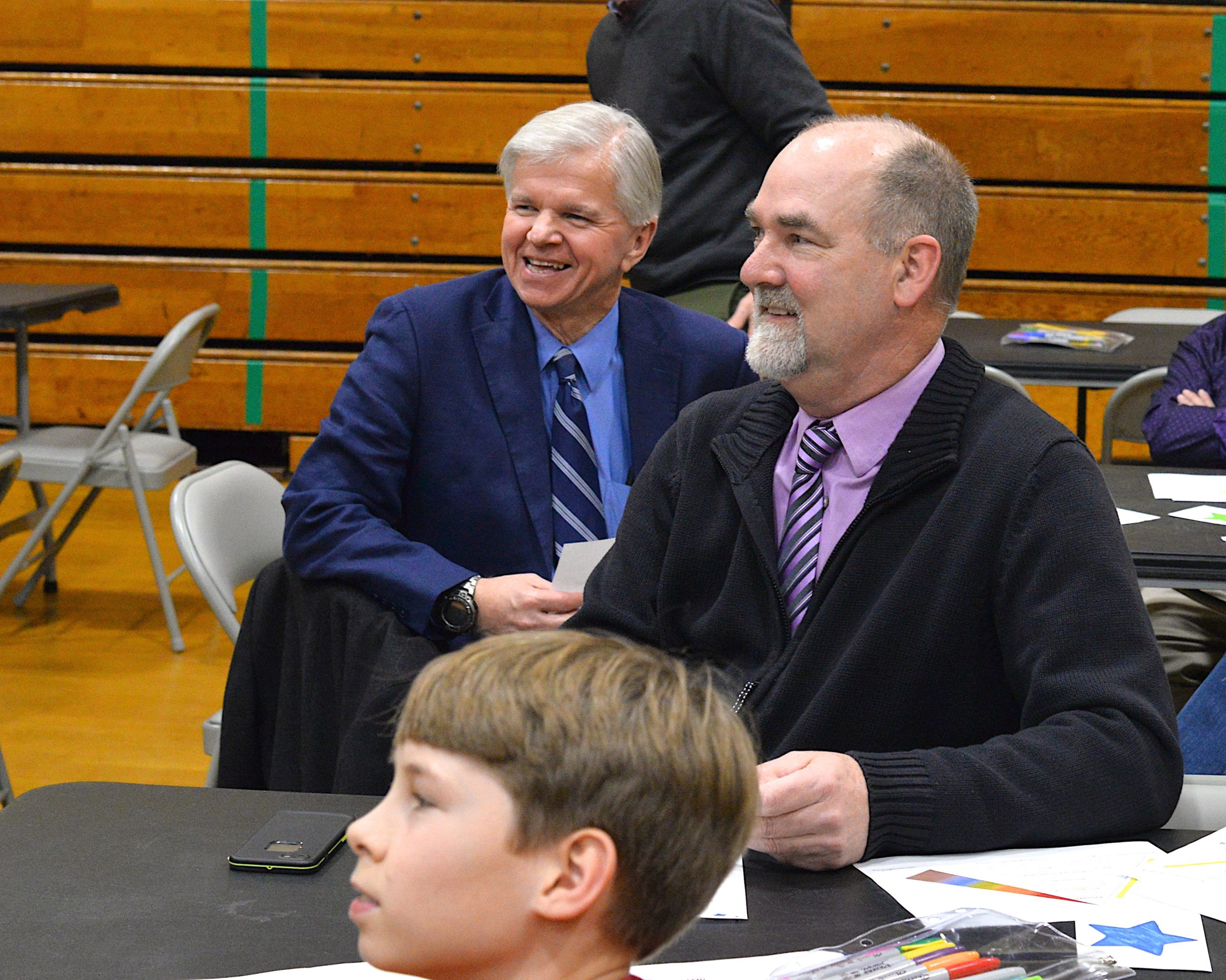 Assemblyman Fred W. Thiele Jr. and East Hampton Town Supervisor Peter Van Scoyoc listen to a presentation at the Springs School Diversity Institute on Friday. KYRIL BROMLEY