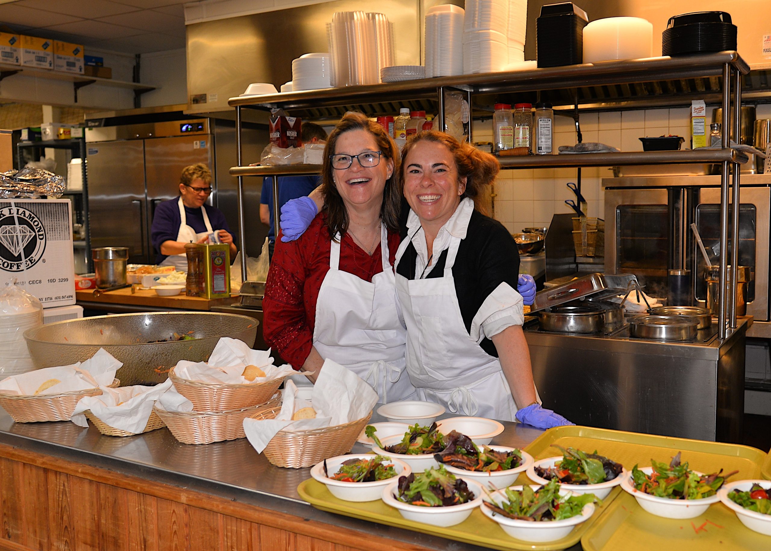 A pasta dinner fundraiser took place at the Montauk firehouse on Saturday to benefit the Robert R. Fisher scholarship fund. Regan Moloney and Shannon Coppola helped out. KYRIL BROMLEY
