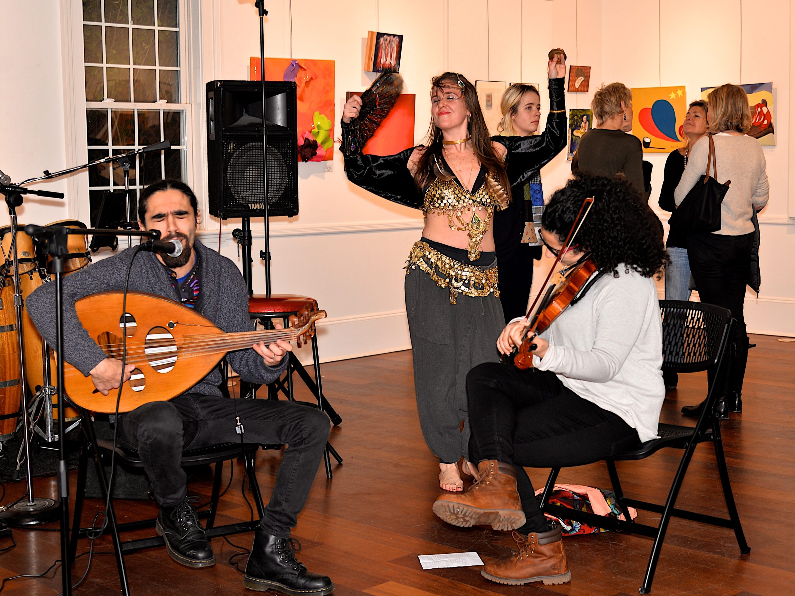 The Love And Passion art show, curated by Karyn Mannix, opened at Ashawagh Hall last weekend and featured art work, music, dancing and poetry. Molly Moonbeam dancing while the Al Hawili Band plays. KYRIL BROMLEY 