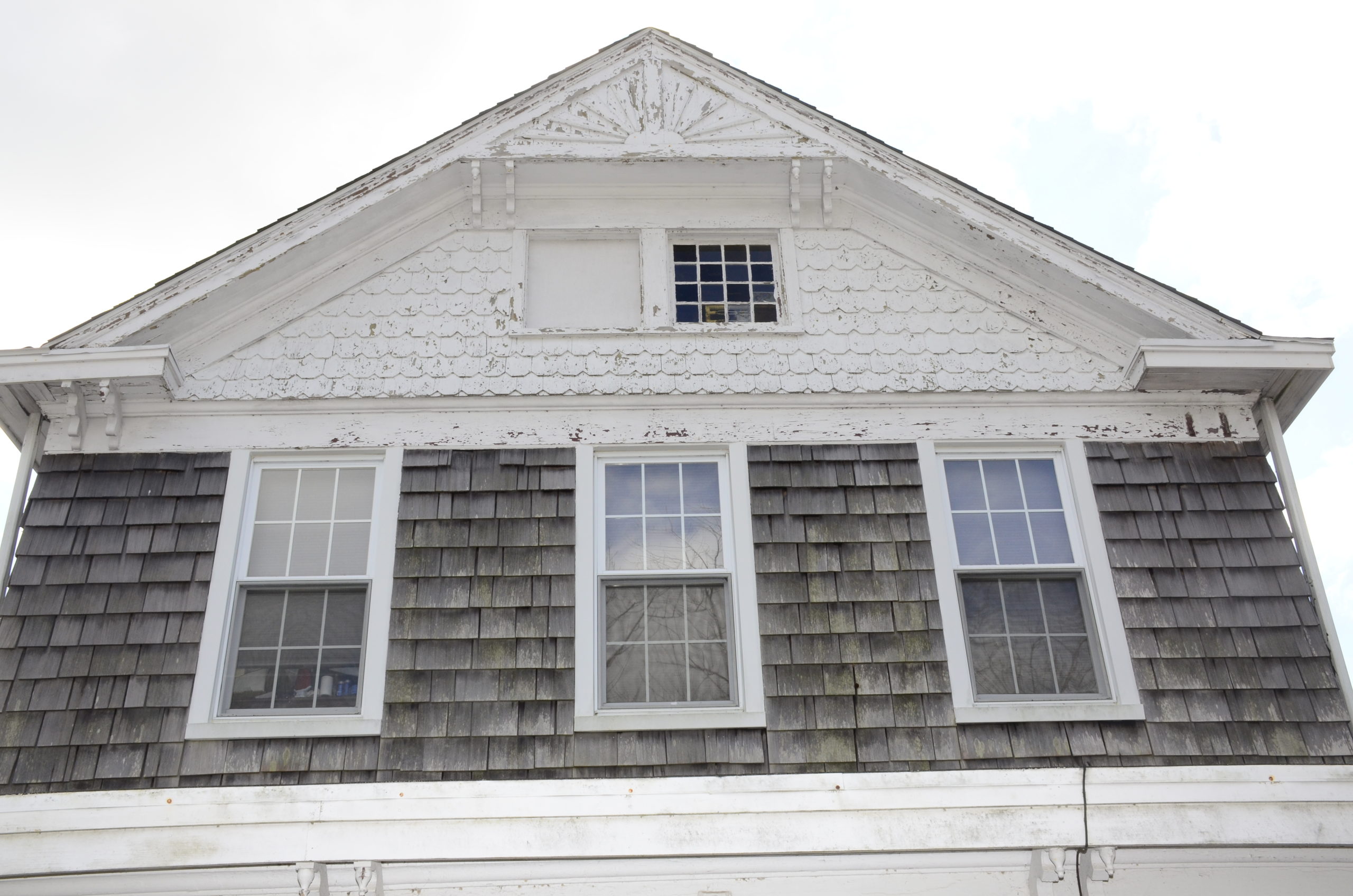 Now that the Topping-Raynor House is a historic landmark in the Town of Southampton, Eleanor Kobel hopes to be able to obtain a grant from the state to help pay for things like the replacement of a window that was blown out during Hurricane Sandy. GREG WEHNER