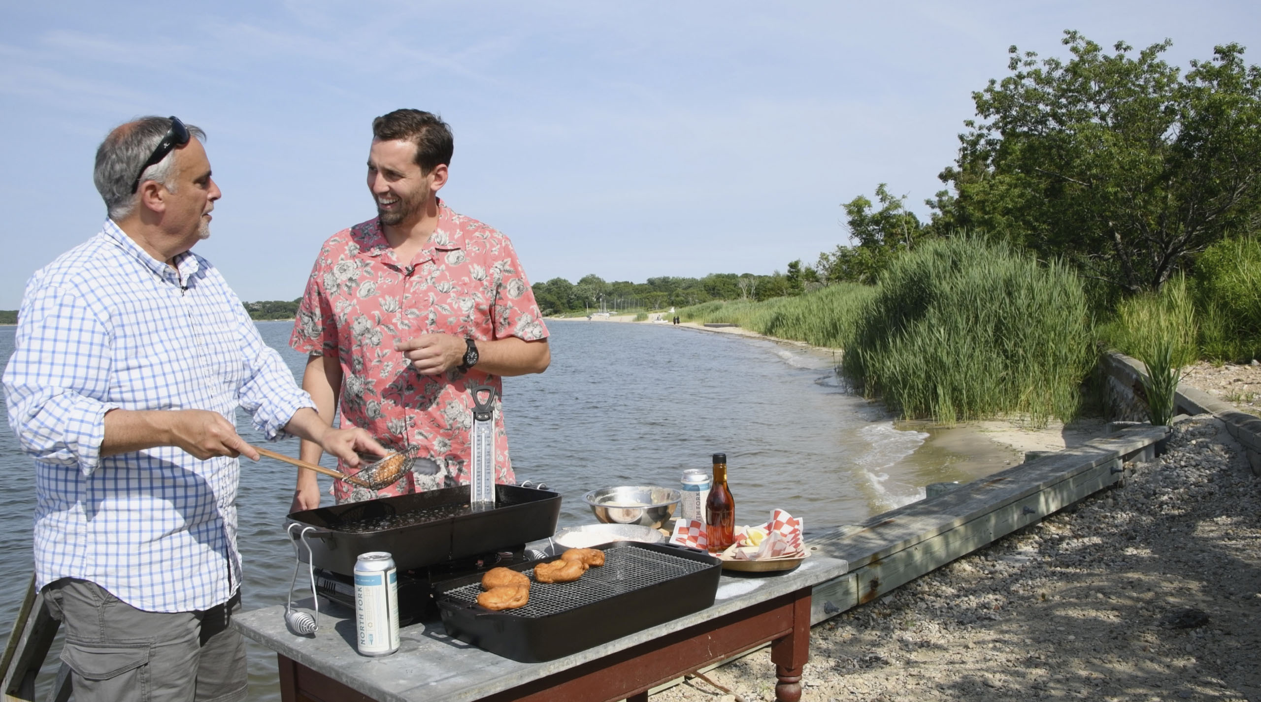 Chef George Hirsch and Alex Goetzfried cooking waterside at Cormaria in Sag Harbor.
