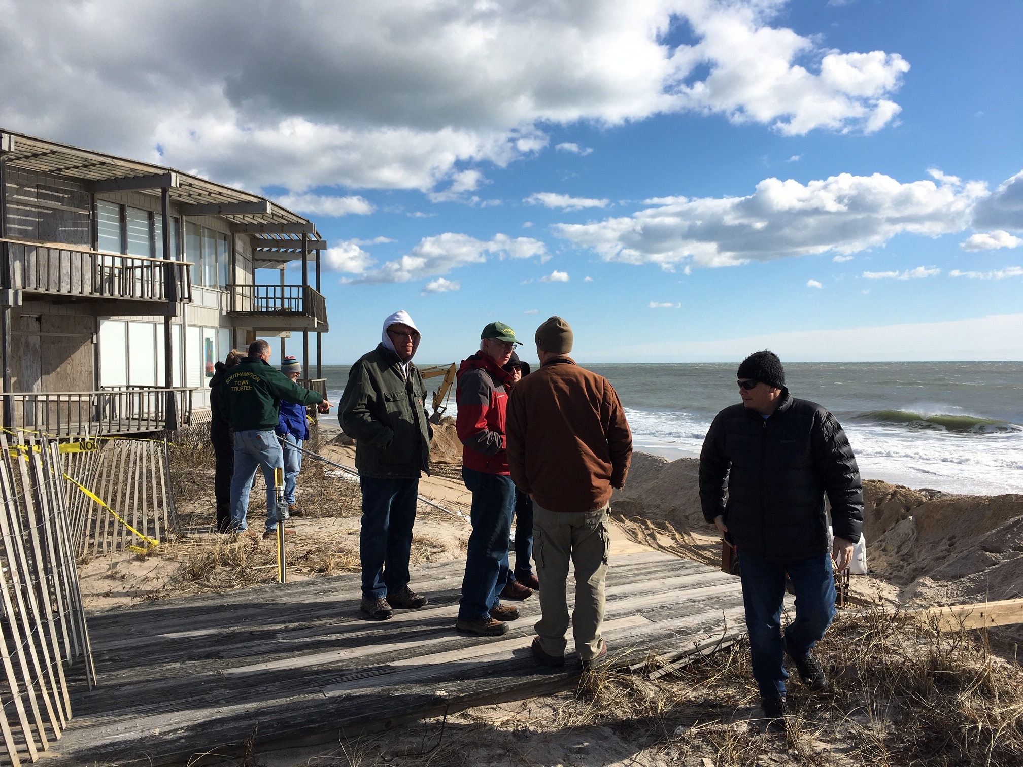 The Southampton Town Trustees toured Round Dune Condominiums in East Quogue as geocubes were installed. COURTESY JAMES DURYEA