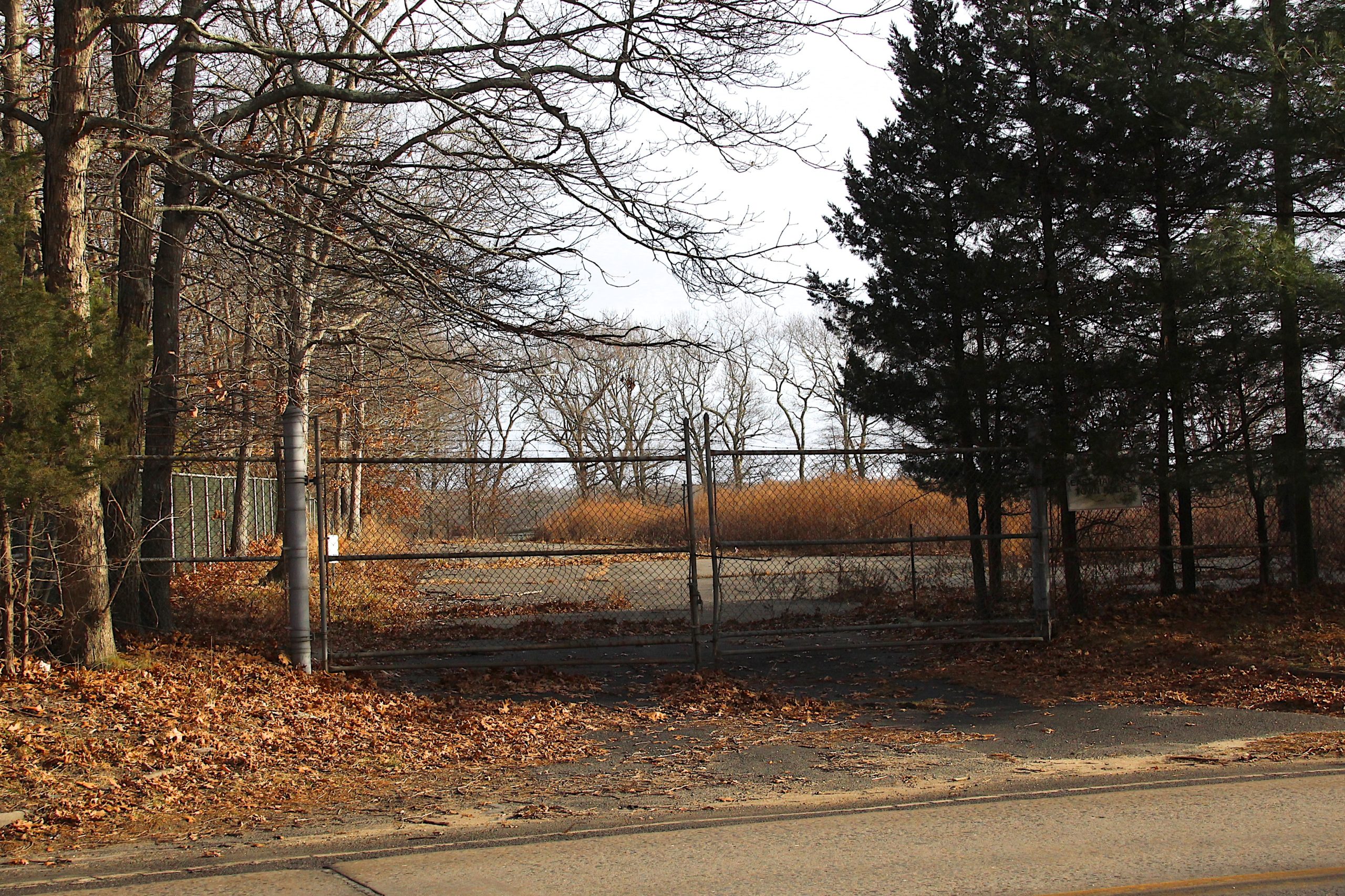 Two years after voters approved the purchase, the East Hampton School District on Monday closed on the purchase of the former East Hampton Town scavenger waste treatement center. The property will be converted into a bus depot and classroom for a new mechanics vocational program.KYRIL BROMLEY