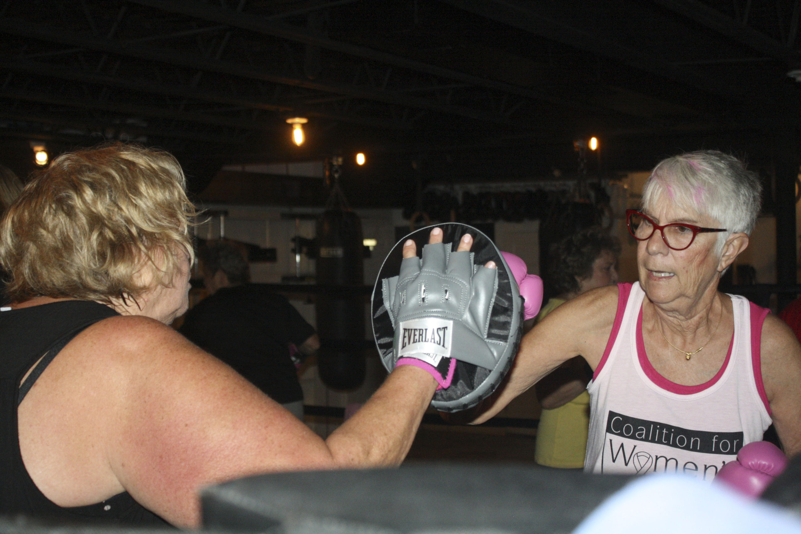 Fight Mode, founder Susie Roden, left, in the ring with Vicki Durand. CALIN RILEY