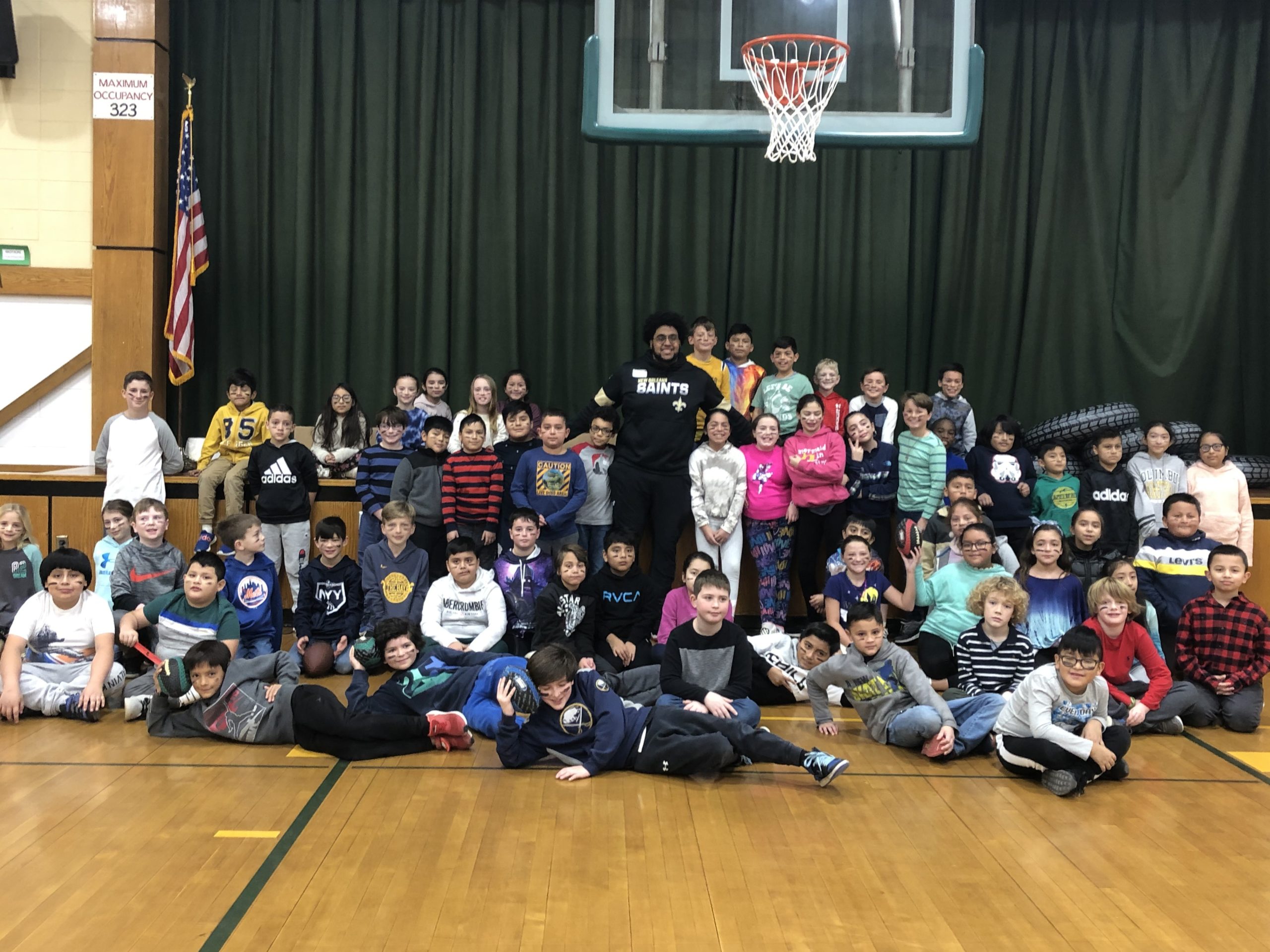 New Orleans Saints offensive lineman Ethan Greenidge visited fourth-graders at Springs School recently. During his visit, he talked about the importance of teamwork and dedication. Students also got to practice their interviewing skills. He is the brother of a teaching assistant. 