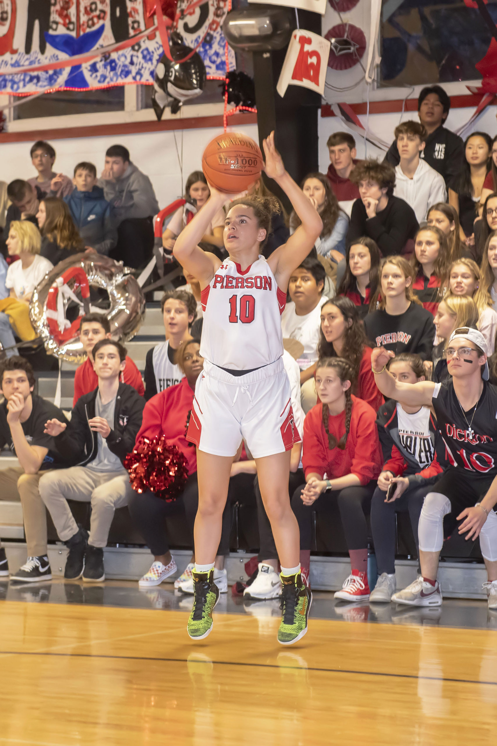 Pierson's Chastin Giles shoots a three-pointer. She made four of them as part of her 19-point effort in the victory over Babylon on Friday night.