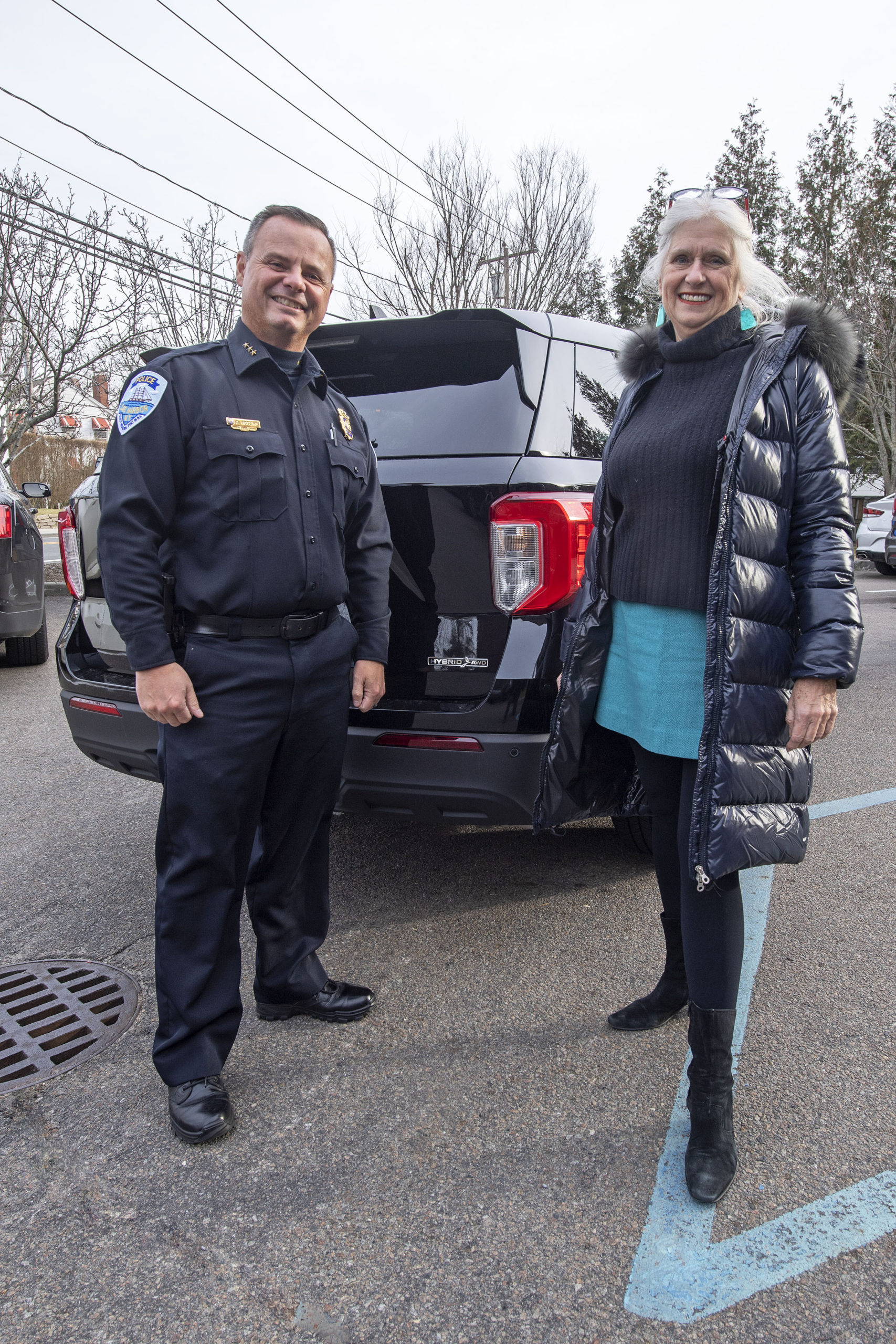 Sag Harbor Village Mayor Kathleen Mulcahy and Sag Harbor Village Police Chief Austin J. McGuire with the village's first hybrid SUV. 