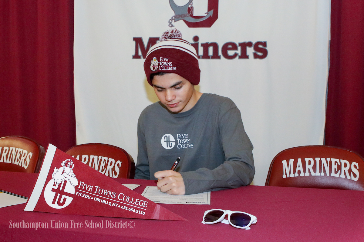 Southampton High School senior Brian Solano committed to play soccer at Five Towns College during a letter of intent signing ceremony at Southampton High School on December 17. The three-year varsity soccer player plans to study music production at the school in the fall.