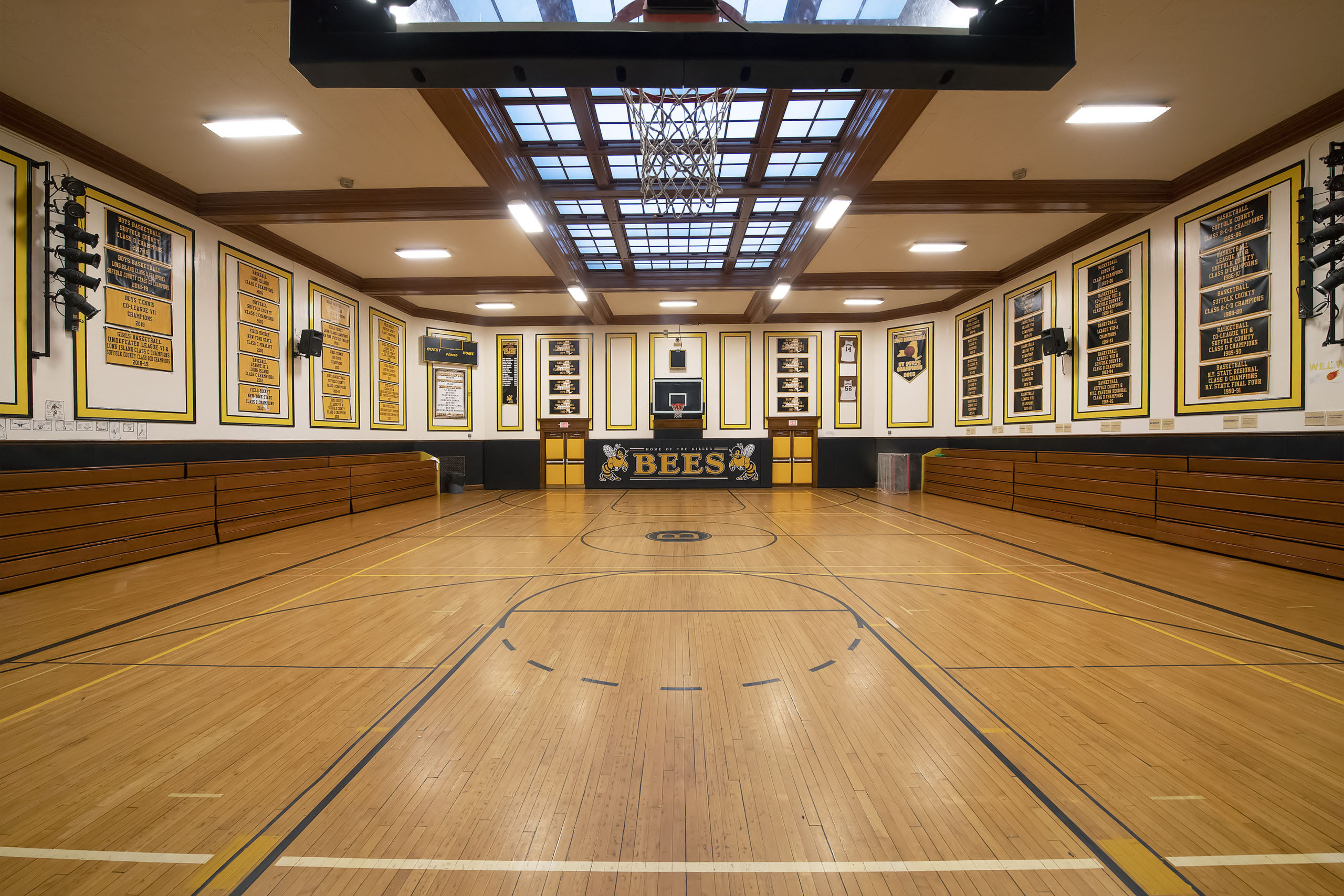 Approximately 4,000 square feet, the Hive measures 37 feet sideline to sideline and 55 feet baseline to baseline, 13 feet and 19 feet smaller, respectively, than a regulation-sized high school basketball court.