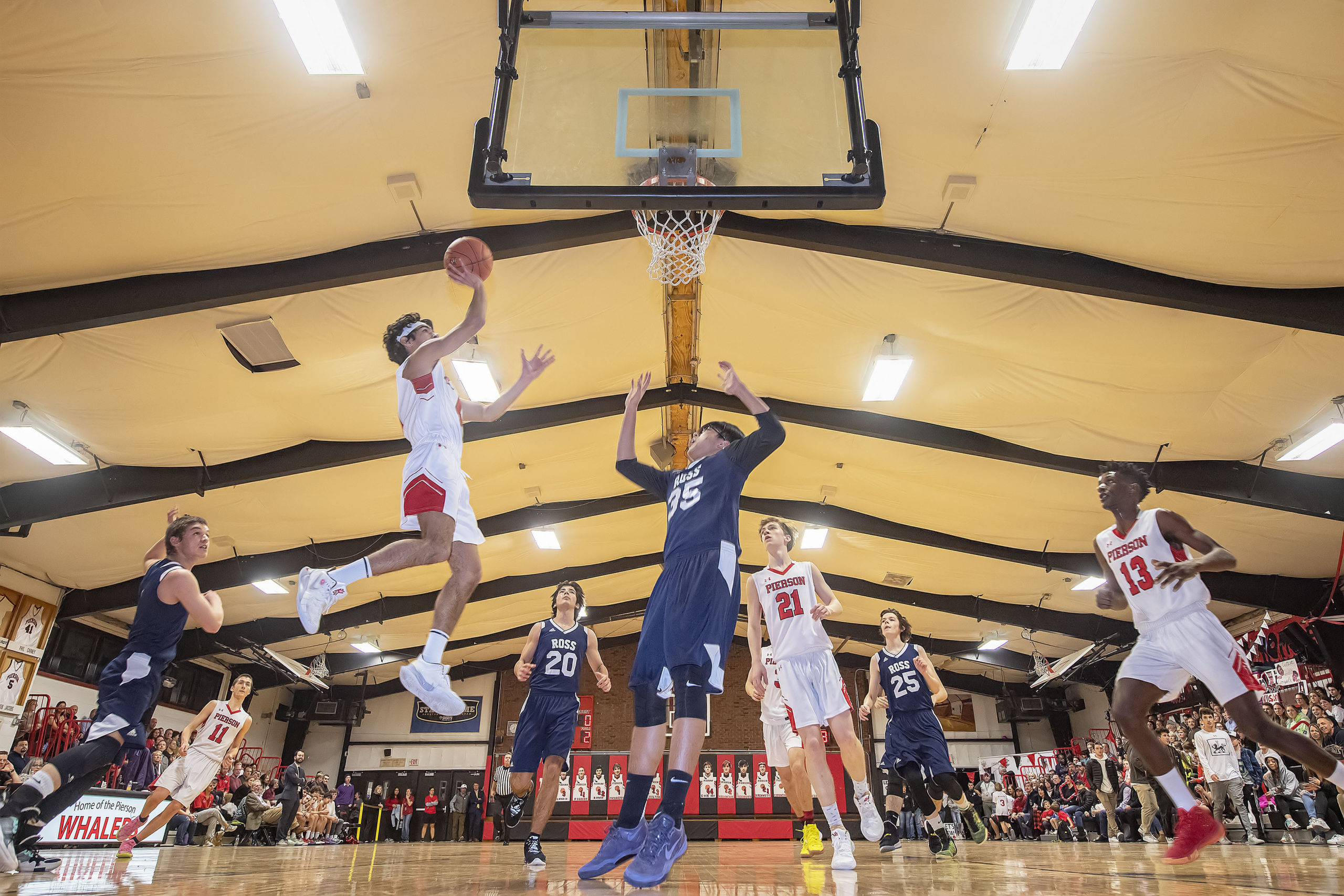 Whaler Peter Schaefer drives to the basket.