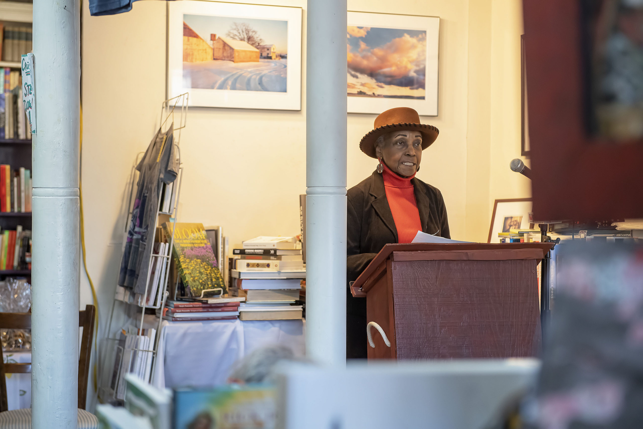 Gloria Brown reads reads a folk tale by Zora Neale Hurstion during the 2020 African-American Read-In that was held in conjunction with he John Jermain Memorial Library at Canio's Books on Saturday.  MICHAEL HELLER