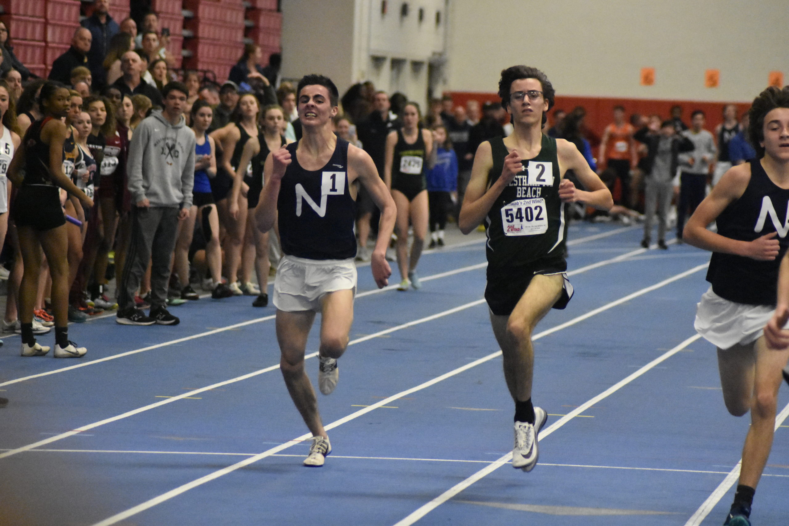 Northport's Thomas Fodor and Gavin Ehlers of Westhampton Beach down the final stretch of the 3,200-meter race.