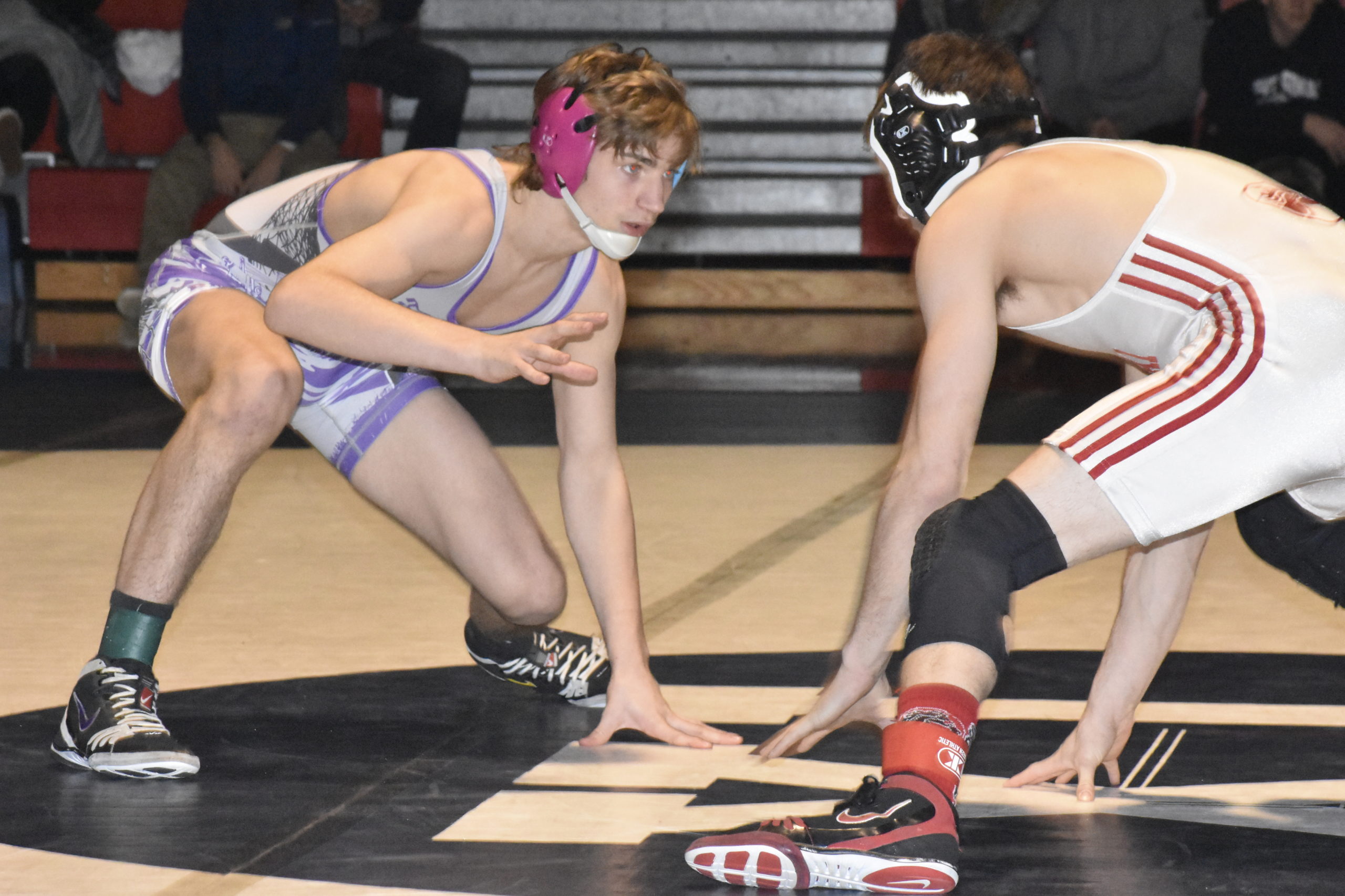 Bayman Willy Kraus faces off against Mount Sinai's Ryan Shanian in the county final.