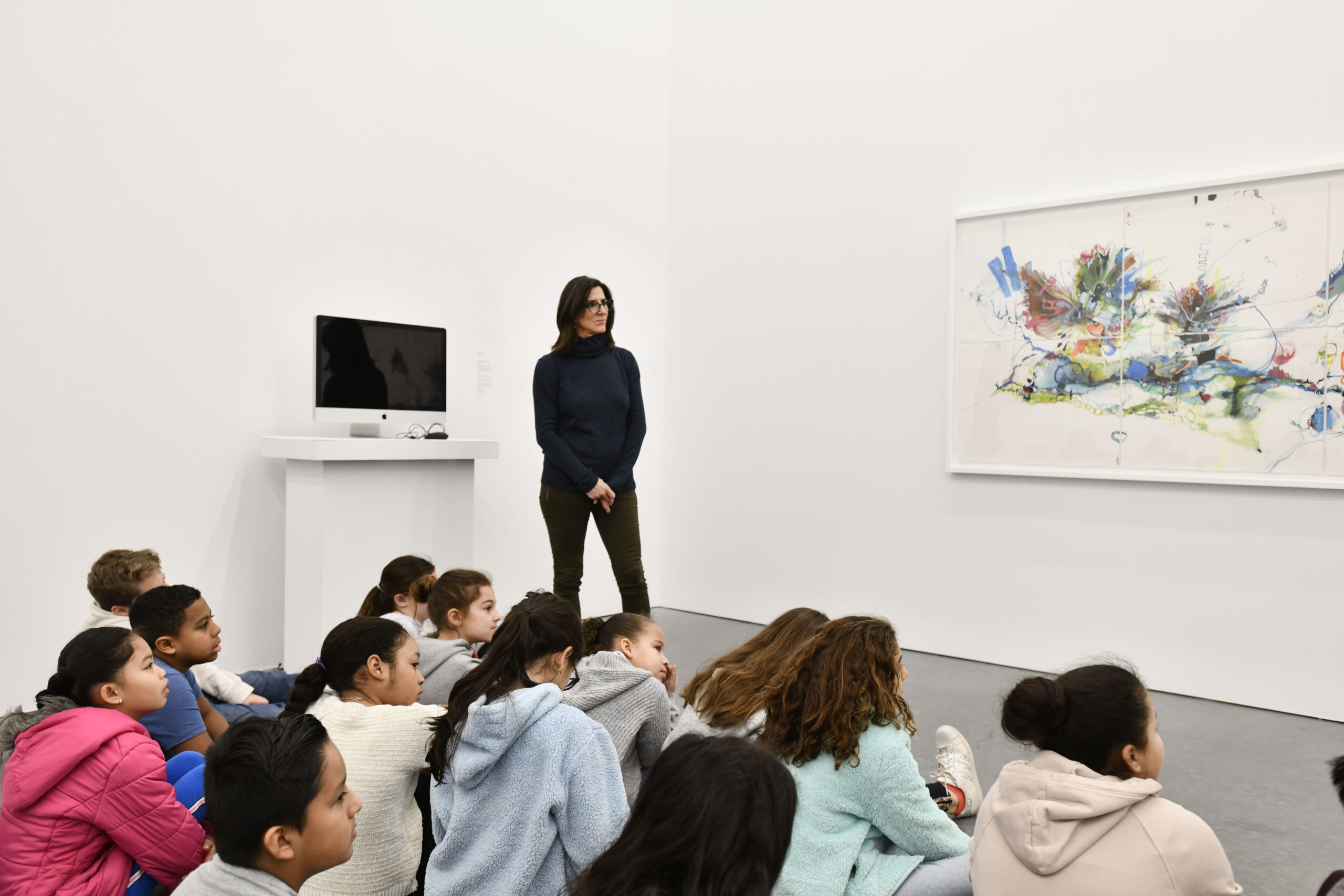 Artist Irina Alimanestianu works with students from the Tuckahoe School's 4th grade classes at the Parrish Art Museum. DANA SHAW