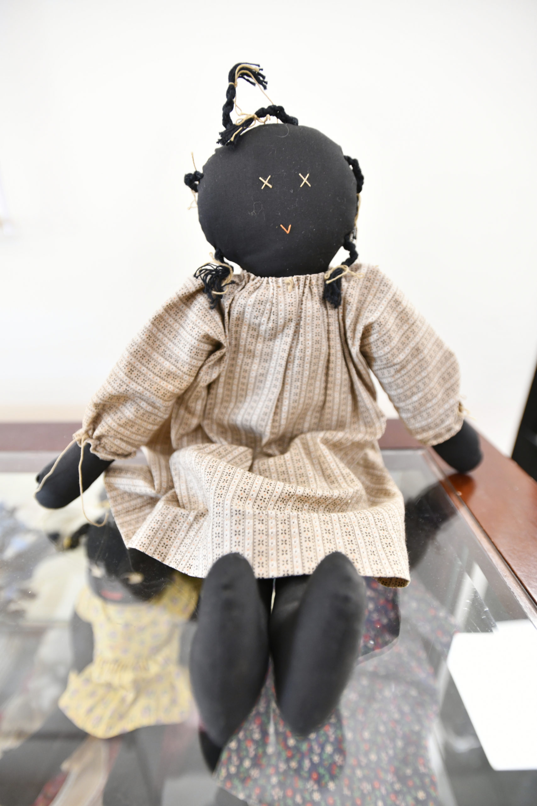 One of Samuel Johnson's many dolls on display at the Rogers Memorial Library.   DANA SHAW