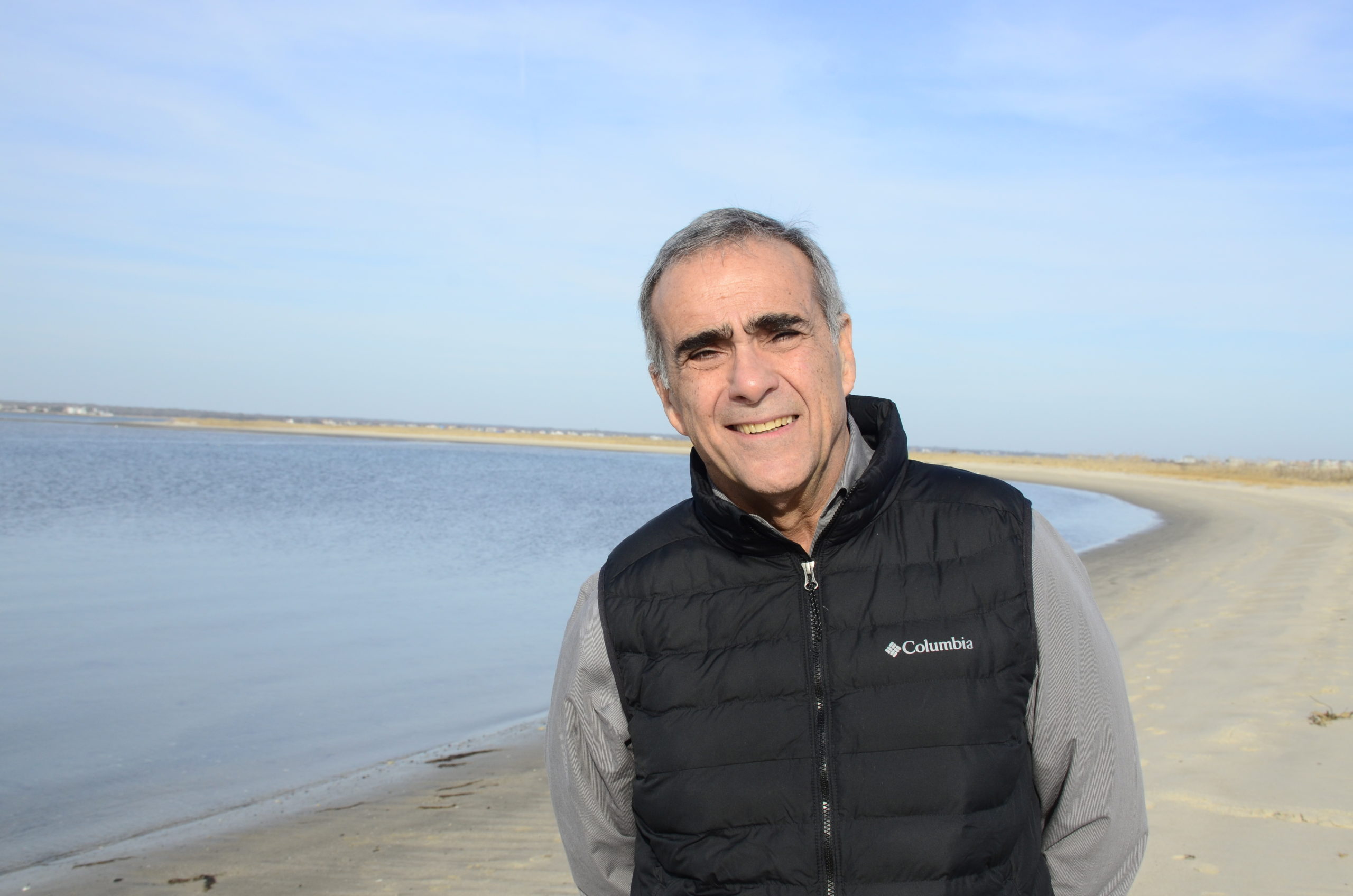 West Hampton Beach Mayor Gary Vegliante stands in front of a spit of sand just west of Pikes Beach, that he plans to build on. GREG WEHNER