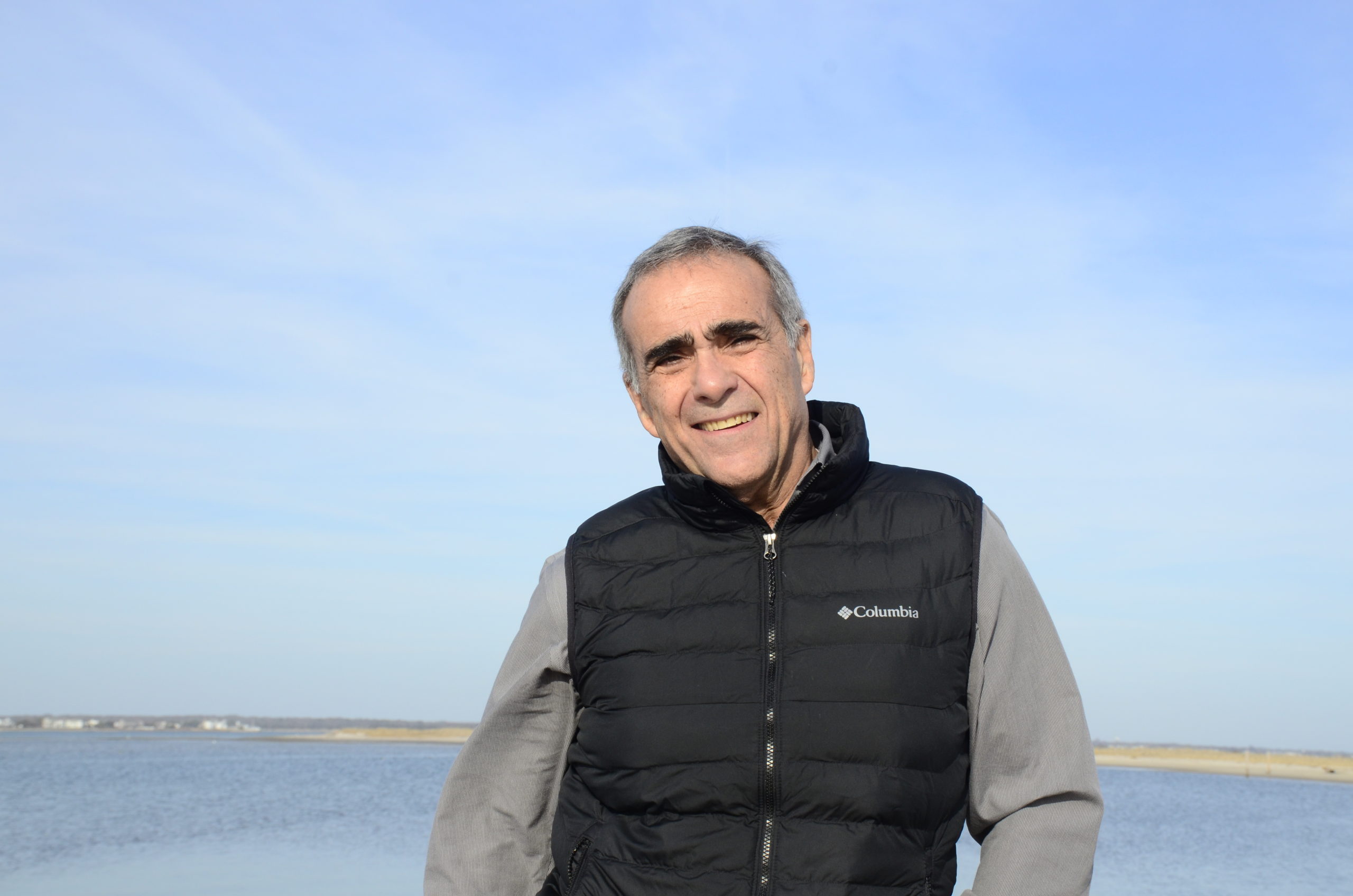 West Hampton Beach Mayor Gary Vegliante stands in front of a spit of sand just west of Pikes Beach, that he plans to build on. GREG WEHNER