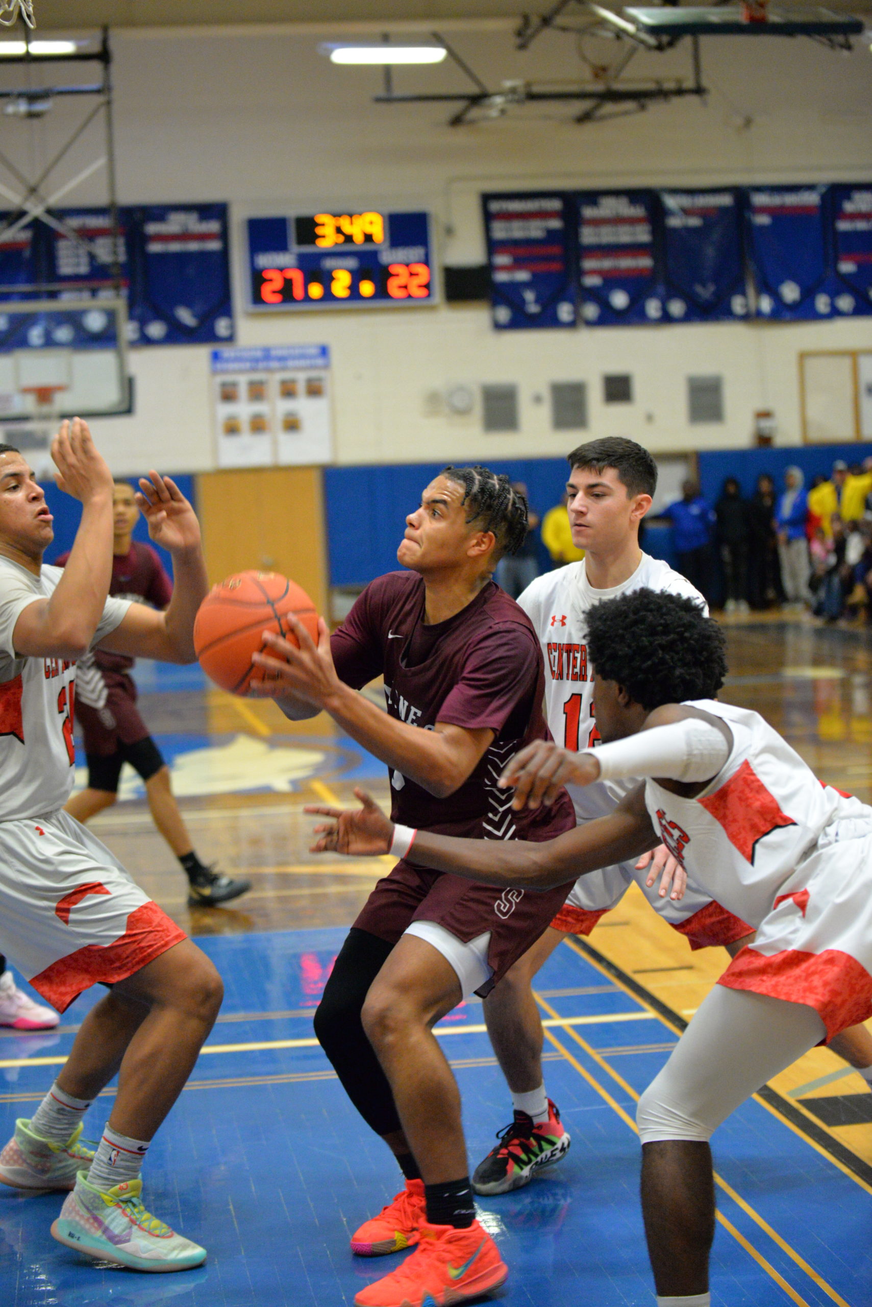 Southampton sophomore LeBron Napier is triple-teamed in the paint.