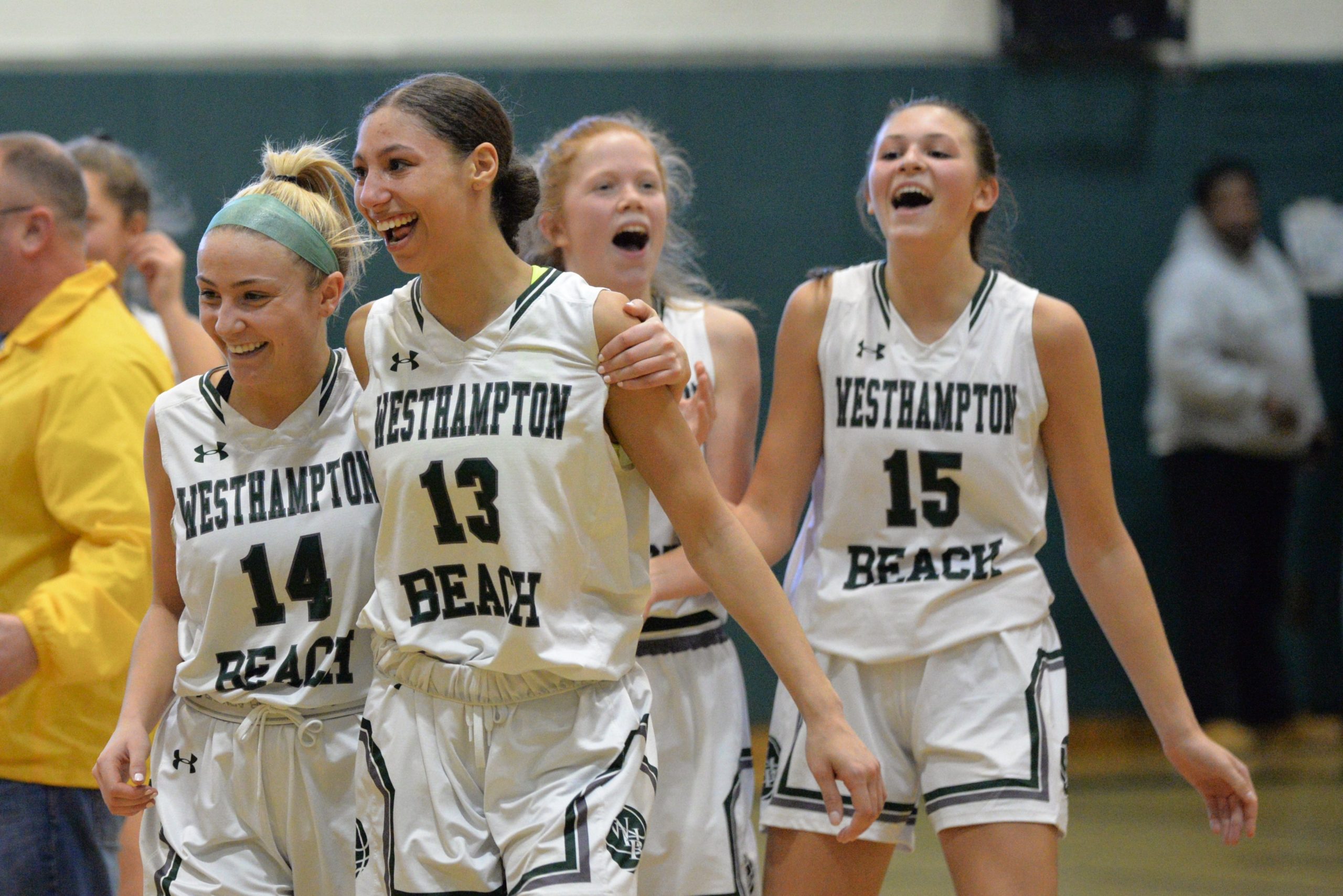 The Lady Canes are all smiles after defeating Hauppauge in the county semis on Friday afternoon.