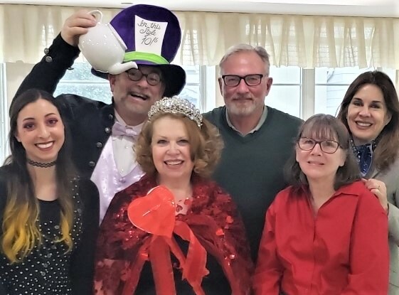 The Rogers Mansion Players, sponsored by the Village of Southampton and Southampton History Museum,  entertained guests at the Hamptons Center for Rehabilitation and Nursing last week. The Valentine Party featured The Queen of Hearts Georgette Chapek, center, along with, left to right,  Liana Mizzi, Mad Hatter Father Patrick Edwards, Tom Edmonds, Laurie Collins, and Southampton Village Trustee Kimberly Allen.