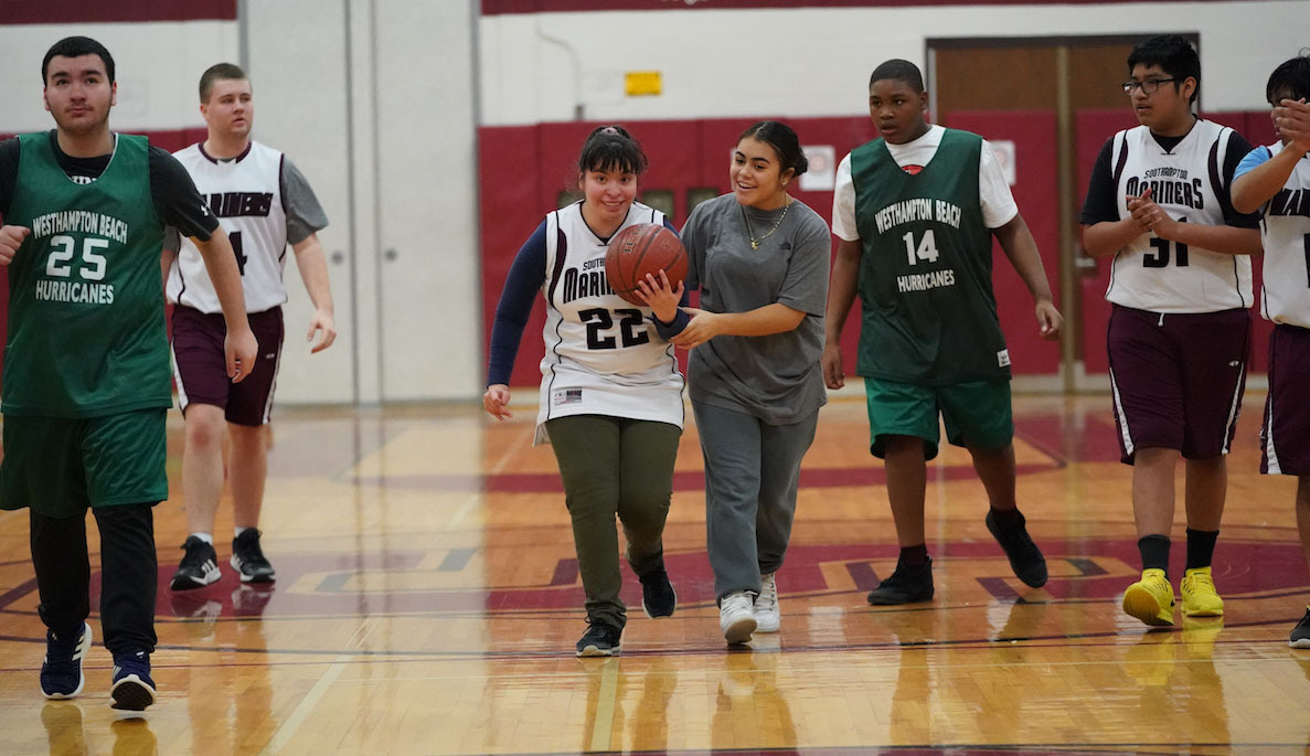 Students from Southampton and Westhampton Beach high schools recently competed in a friendly Special Olympics basketball scrimmage as part of their physical education classes. Players were cheered on by faculty and staff as they showcased their talents on the court.