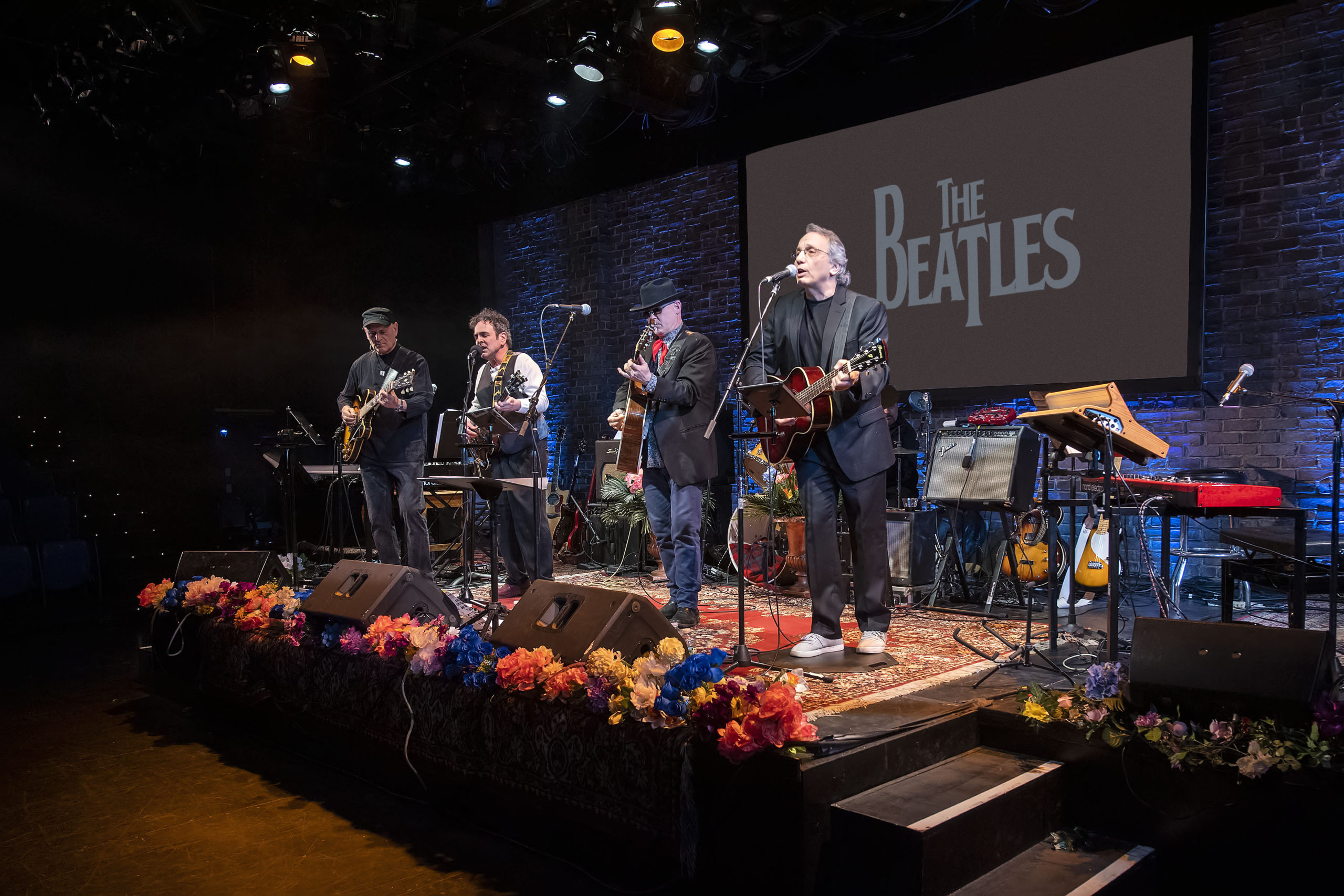 The Moondogs channeling The Beatles at Bay Street Theater.