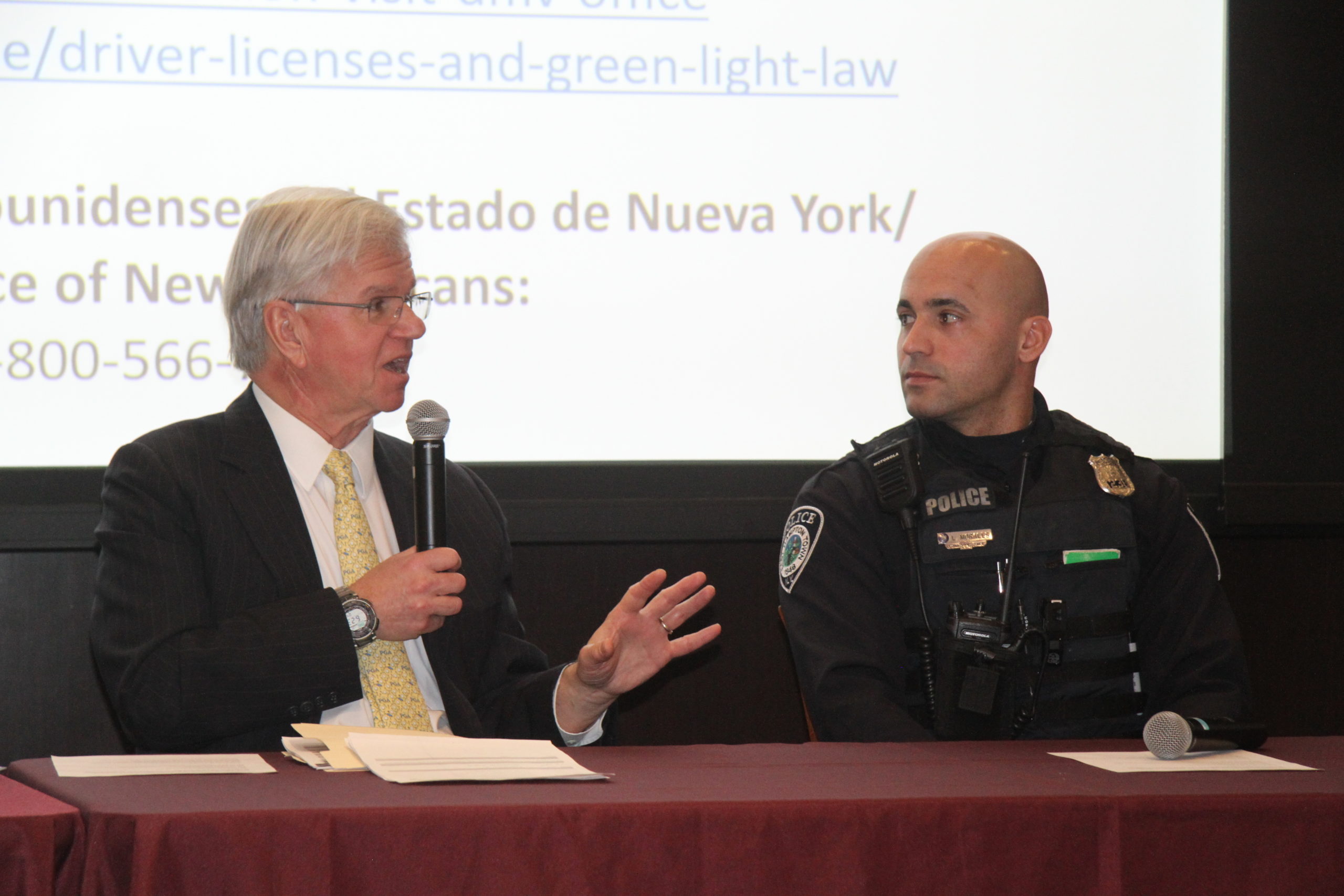 State Assemblyman Fred W. Thiele Jr. and East Hampton Town Police Officer Luis Morales spoke of the benefits the new license law has brought to the Latino community on the East End. 