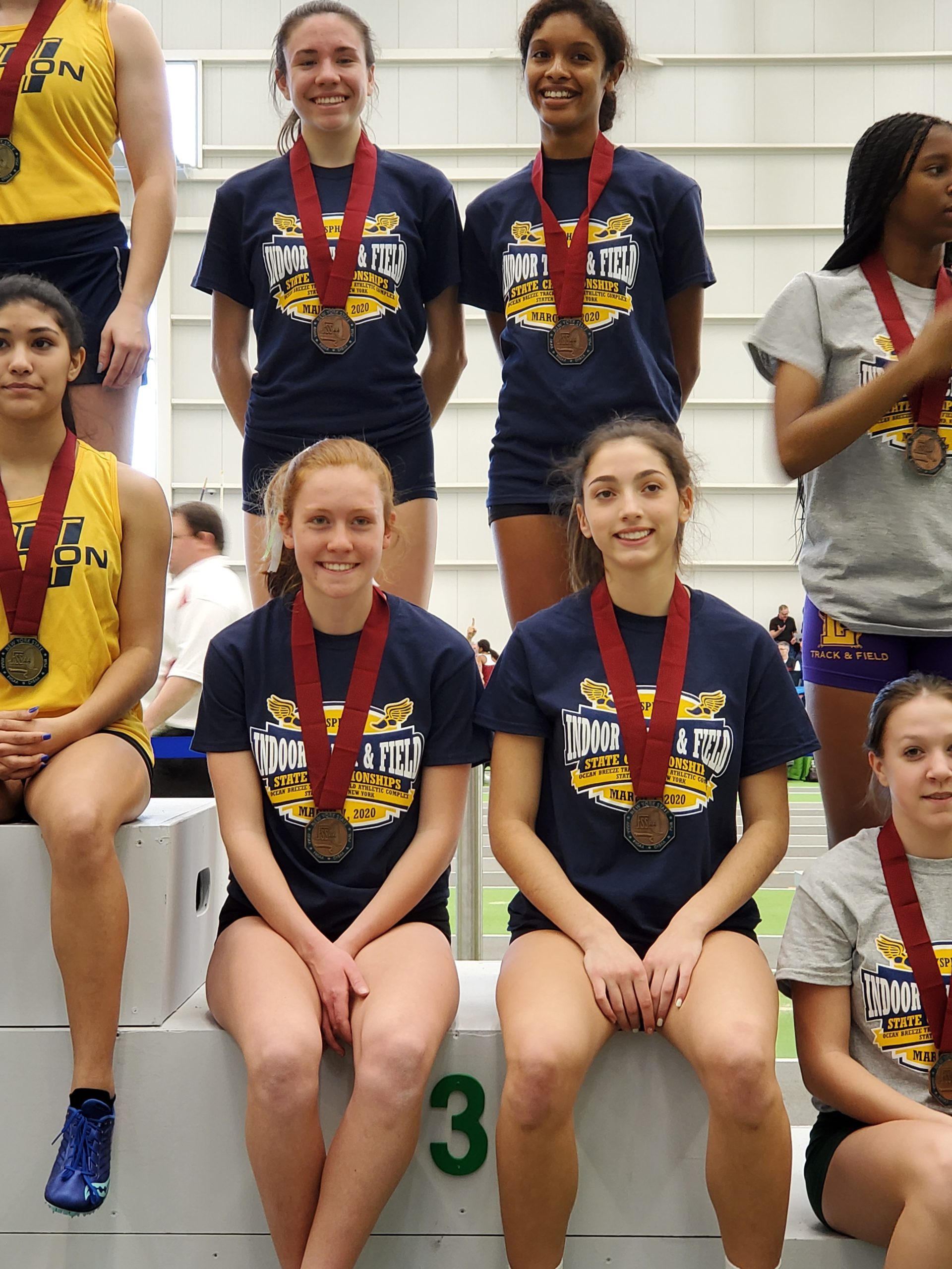 Westhampton Beach junior Jackie Amato, bottom left, earned a bronze medal as part of Section XI's intersectional distance medley relay team. She was joined by Krista DeRaveniere (Riverhead), Kyra Franks (Mt. Sinai) and Danielle Rose (Miller Place).