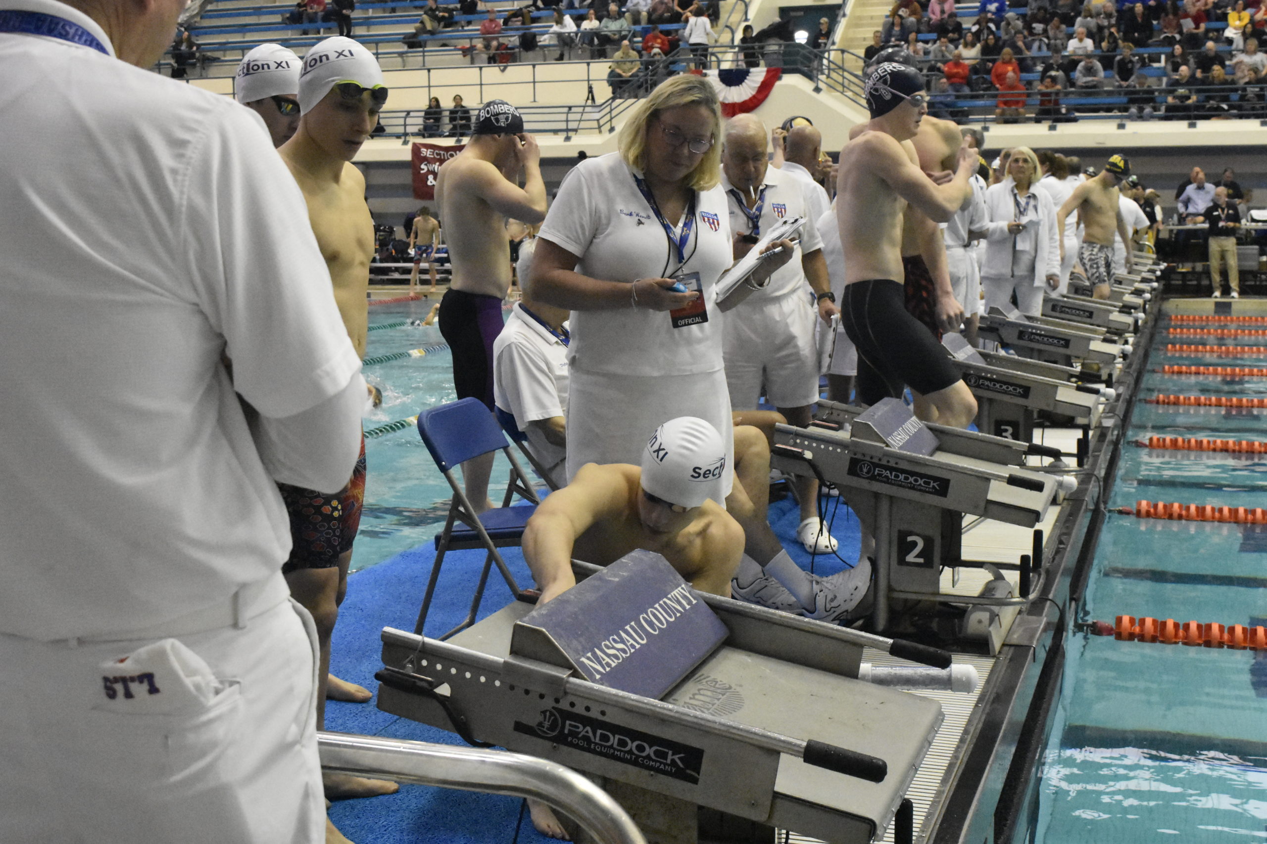 Colin Harrison makes sure everything is good to to go prior to the 200-yard freestyle relay.