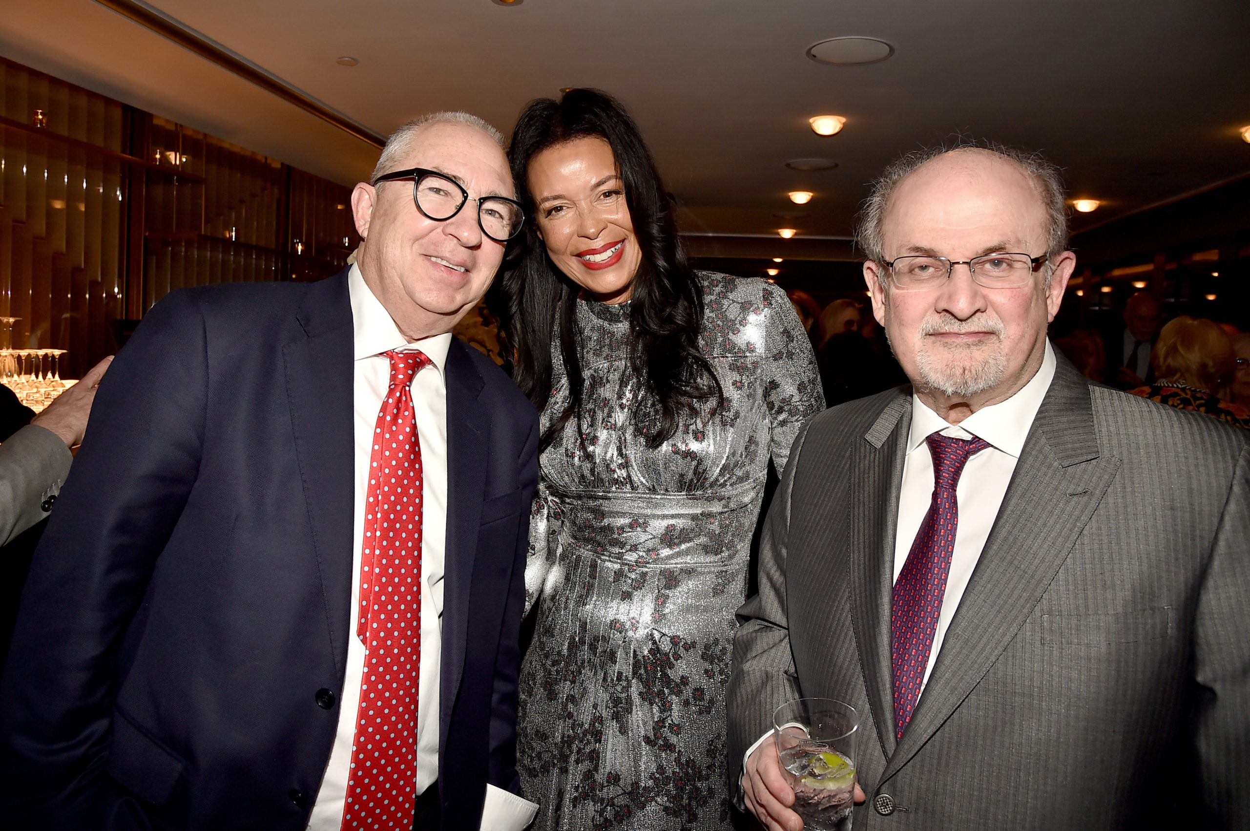 From left, Barry Sonnenfeld, Kim Heirston and Salman Rushdie.