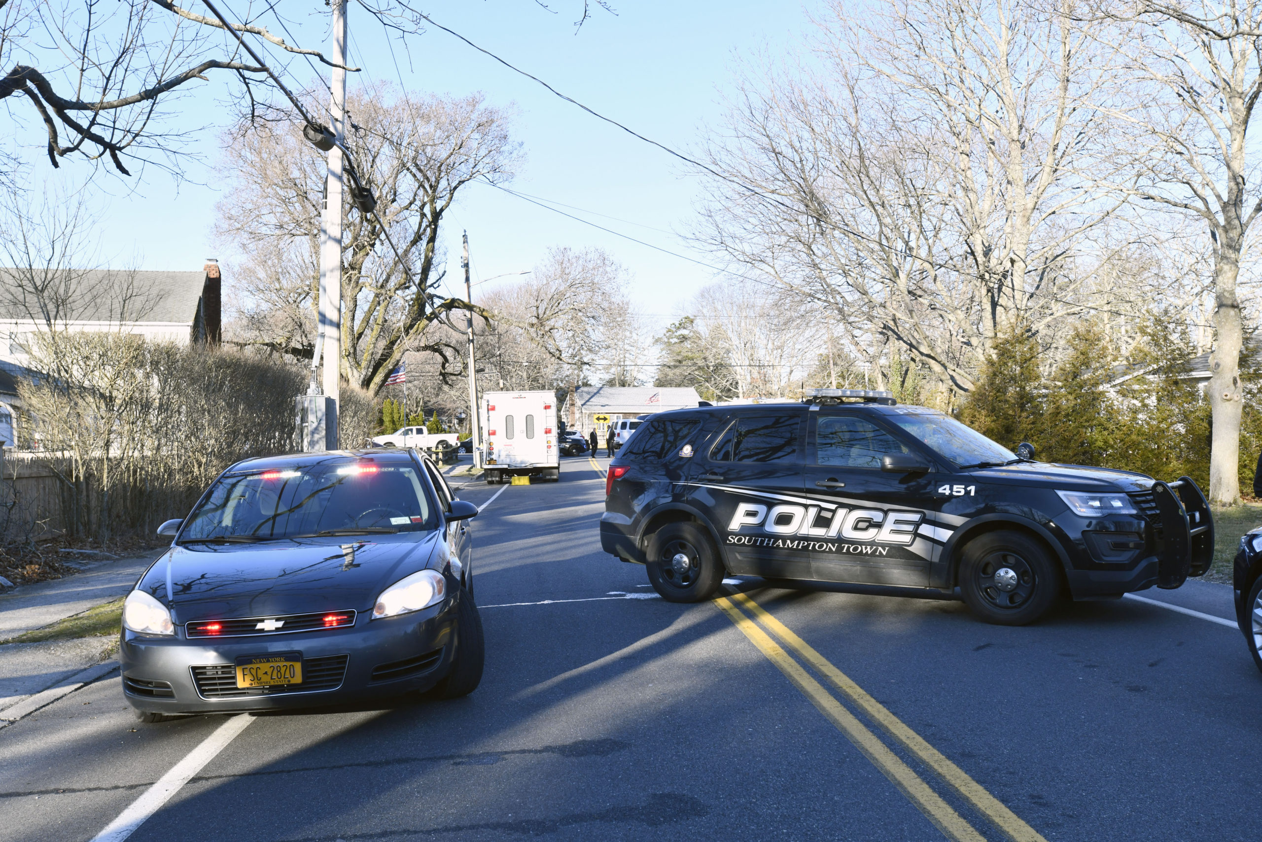 Southampton Town and Suffolk County Police were on the scene Thursday morning of a double shooting that took place on Wednesday night that left two people dead in Hampton Bays.   DANA SHAW